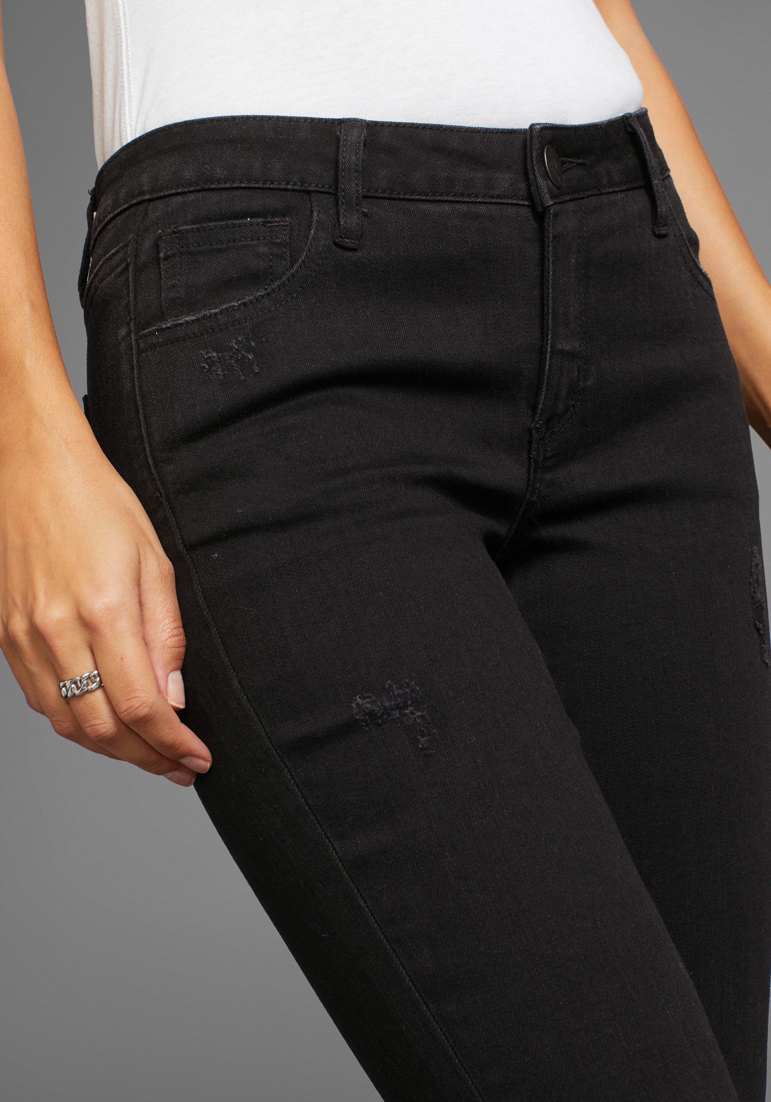 Arizona Bootcut jeans Ultra Stretch uitlopende pasvorm, modieuze used-look, normale taille