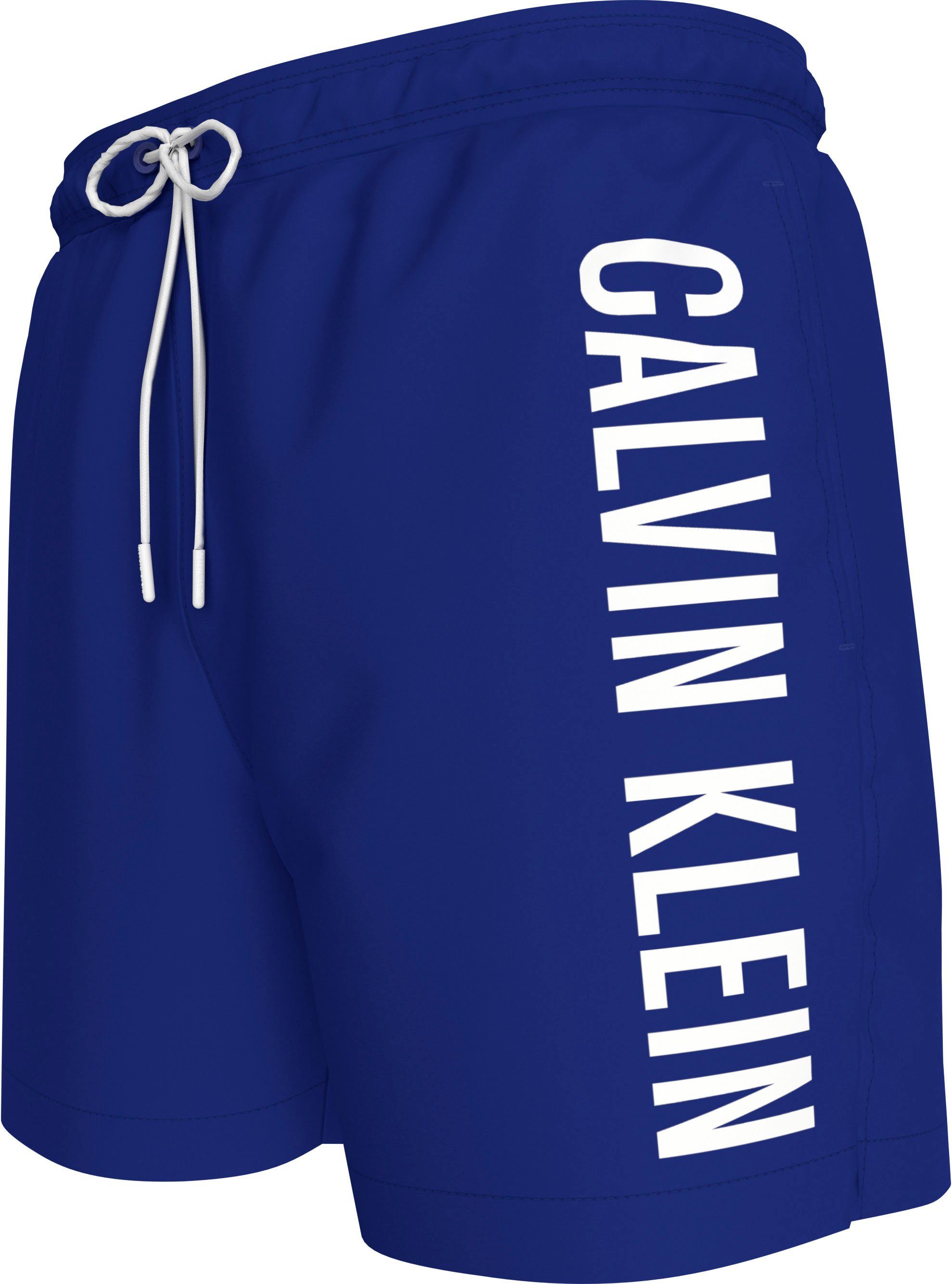 Calvin Klein Swimwear Zwemshort MEDIUM DRAWSTRING met contrasterende logo-opdruk op de pijp