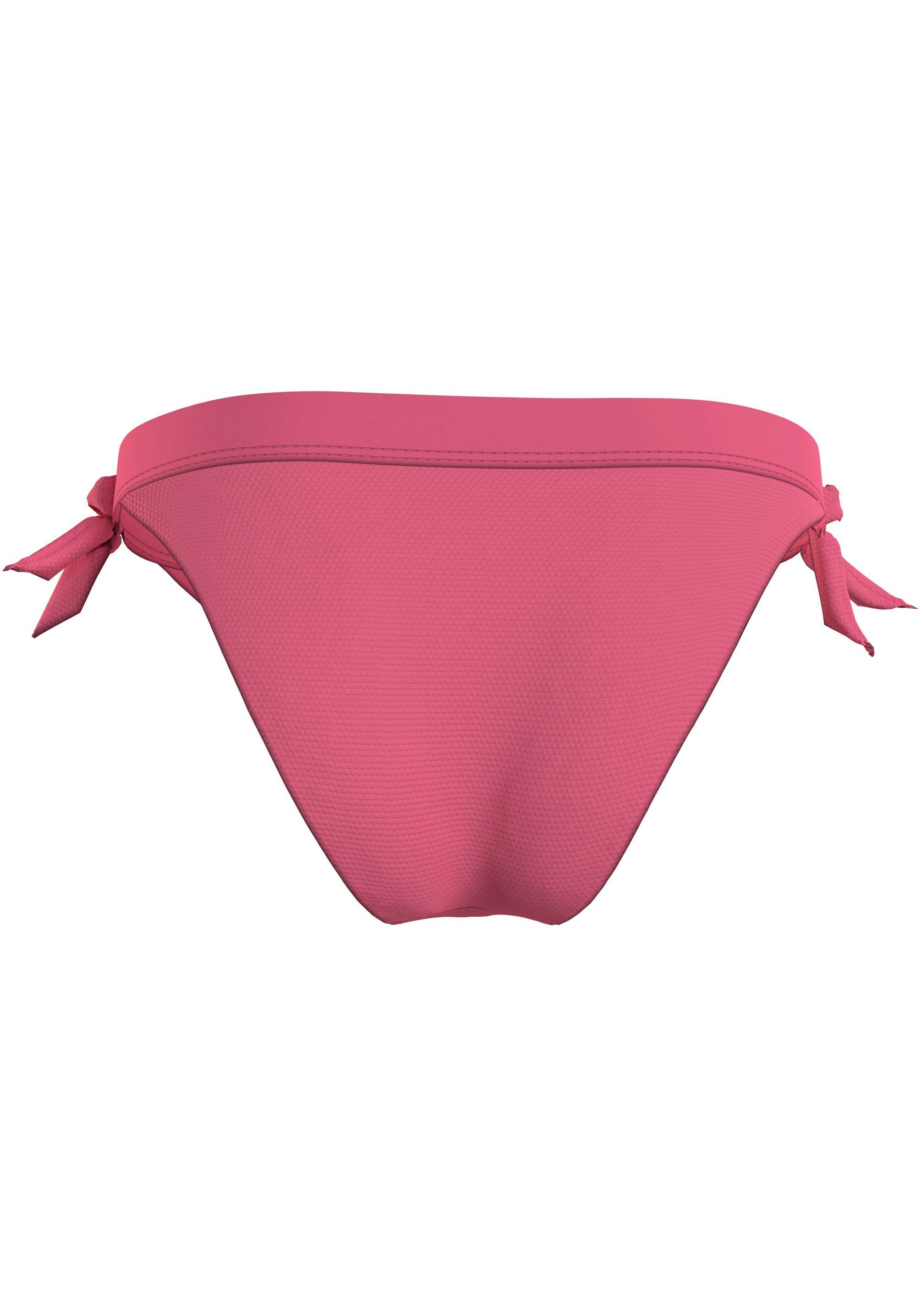 Tommy Hilfiger Swimwear Bikinibroekje SIDE TIE BIKINI met een logo-opschrift