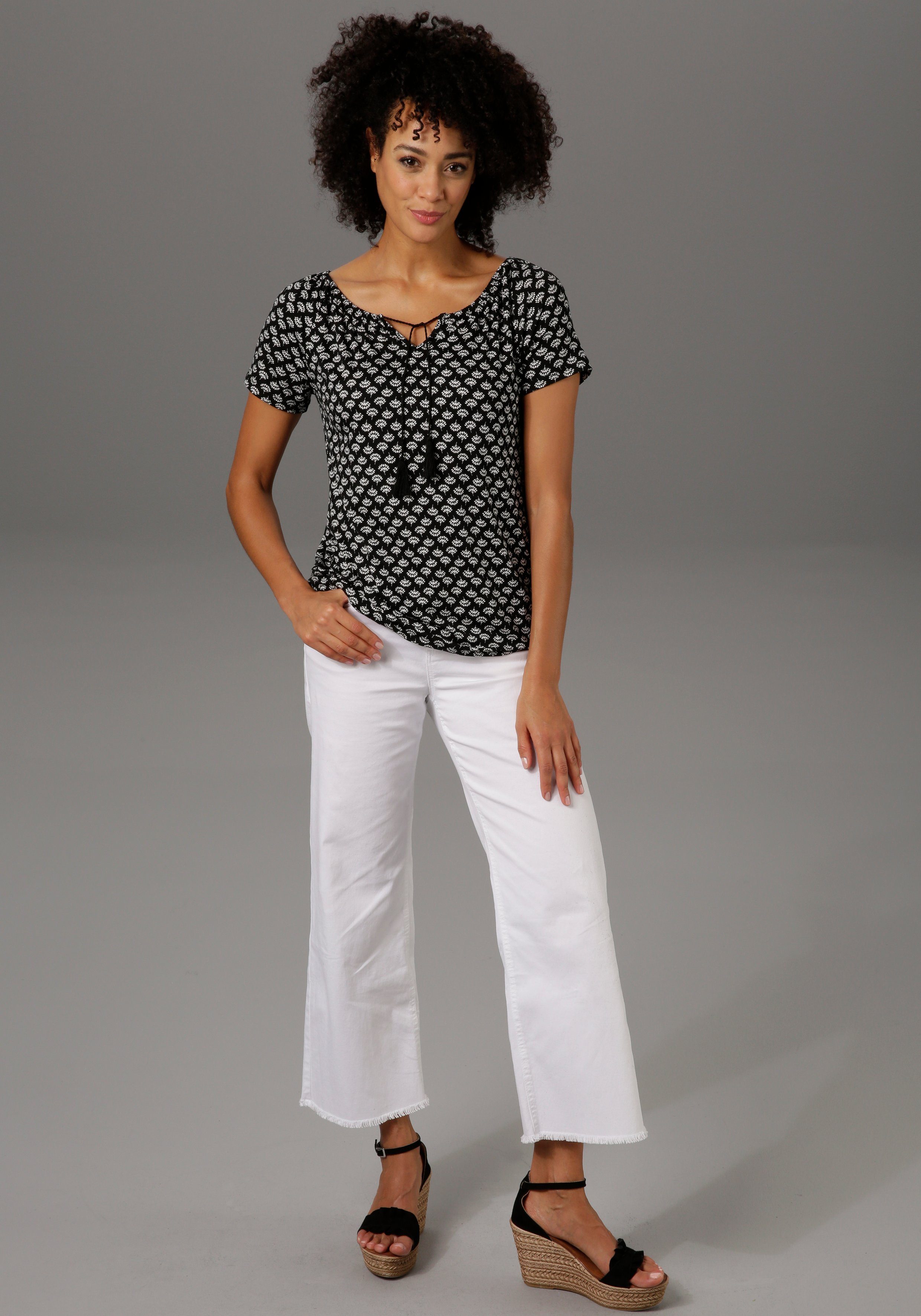 Aniston CASUAL 7/8 jeans met iets gerafelde voetzoom
