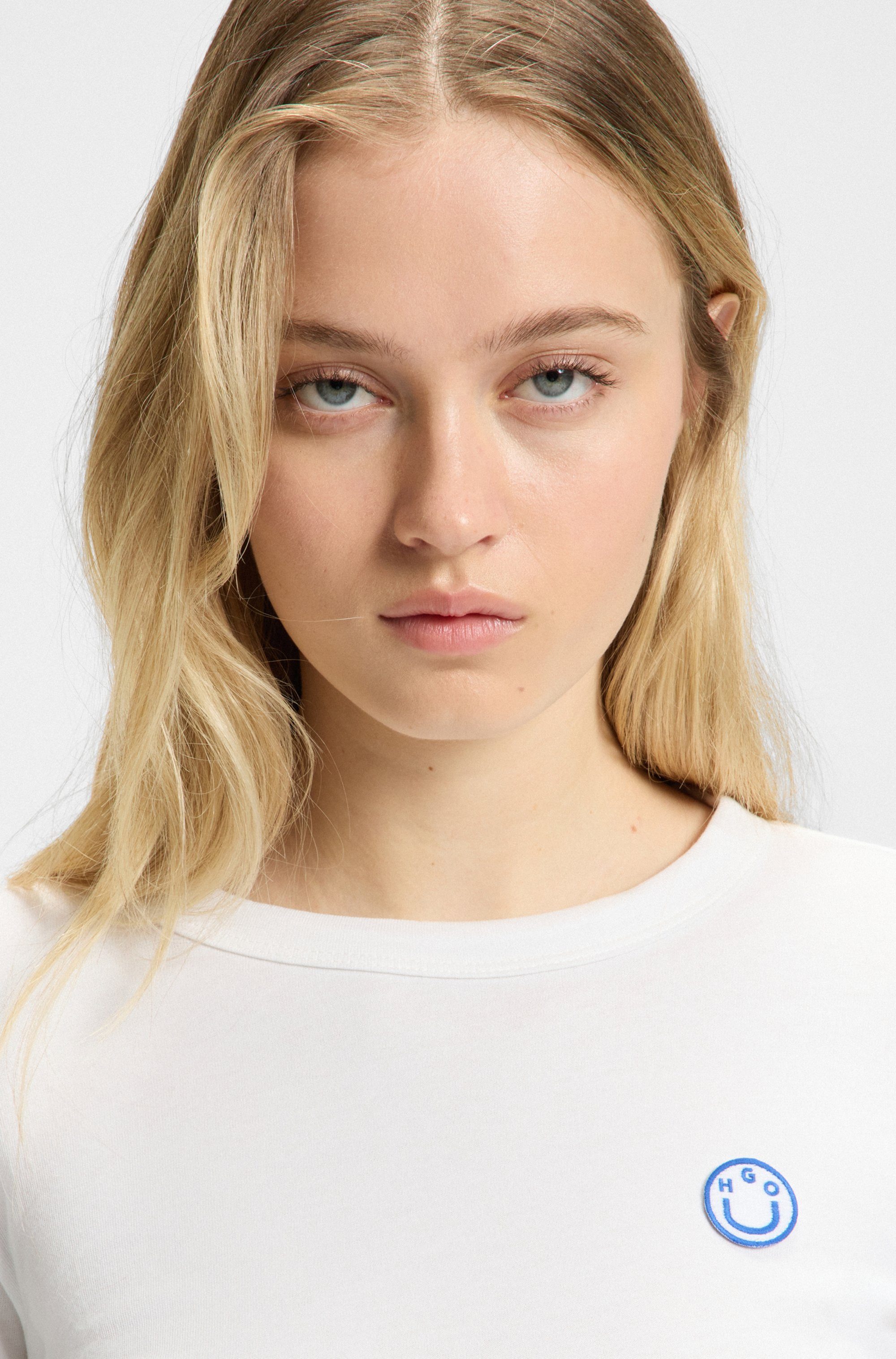 HUGO Blue Longsleeve Daliria met label-badge met happy hugo logo