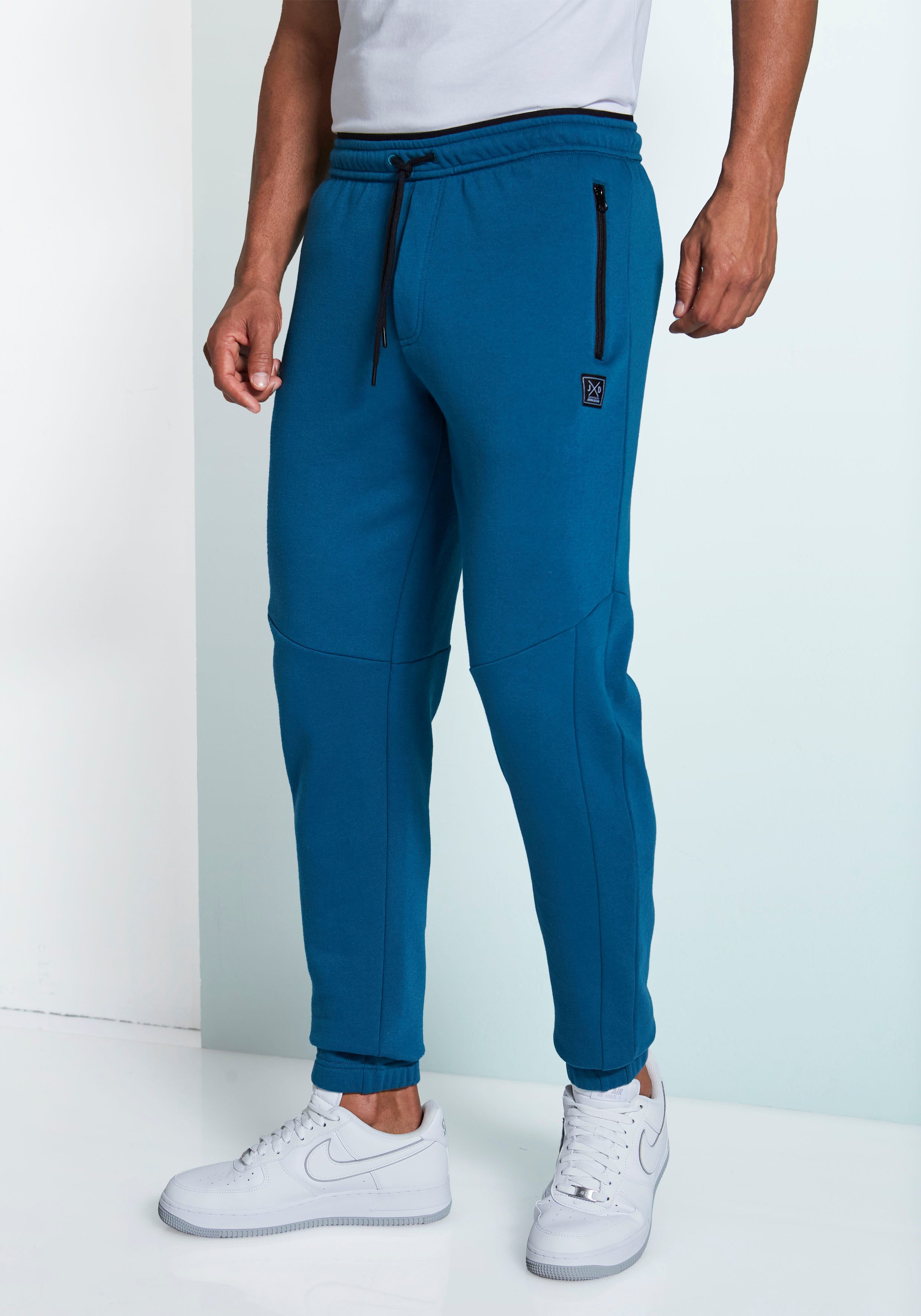 John Devin Sweatbroek Joggingbroek met zijzakken en bindband van katoenmix heren joggingbroeken maat M (48/50) blauw