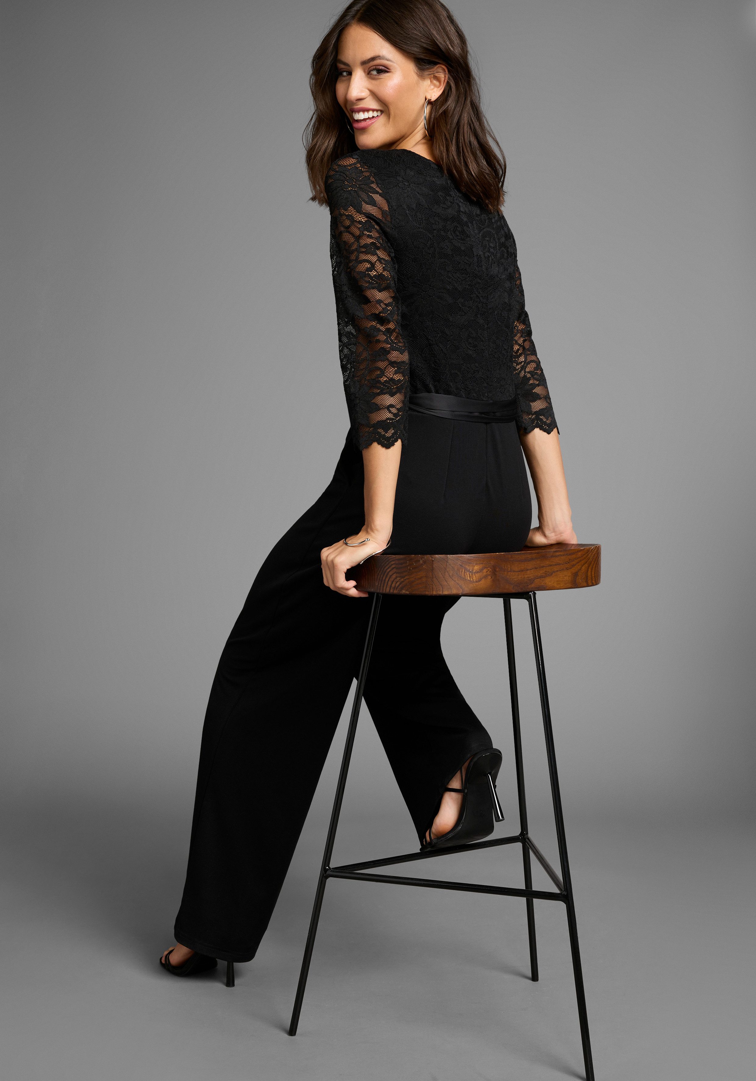 Laura Scott Jumpsuit met kanten bovenstuk en satijnen bindceintuur