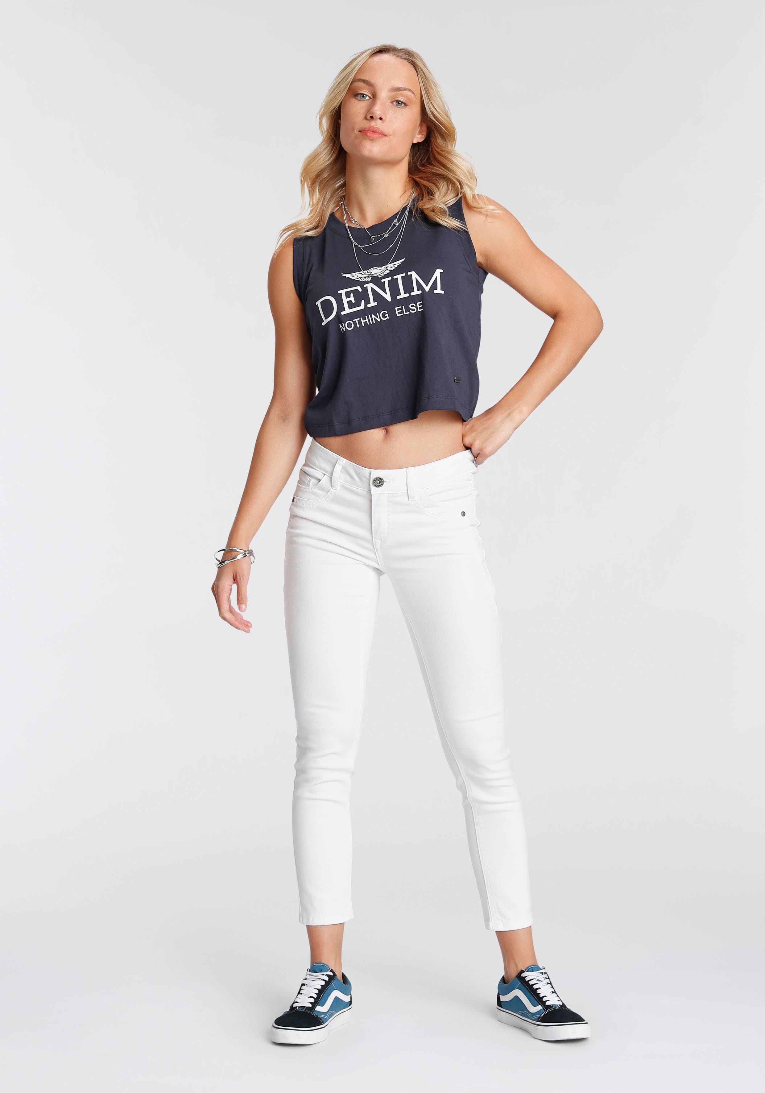 Arizona 7/8 jeans Met geren extra-strakke snit, used-look-wassing, lage taille