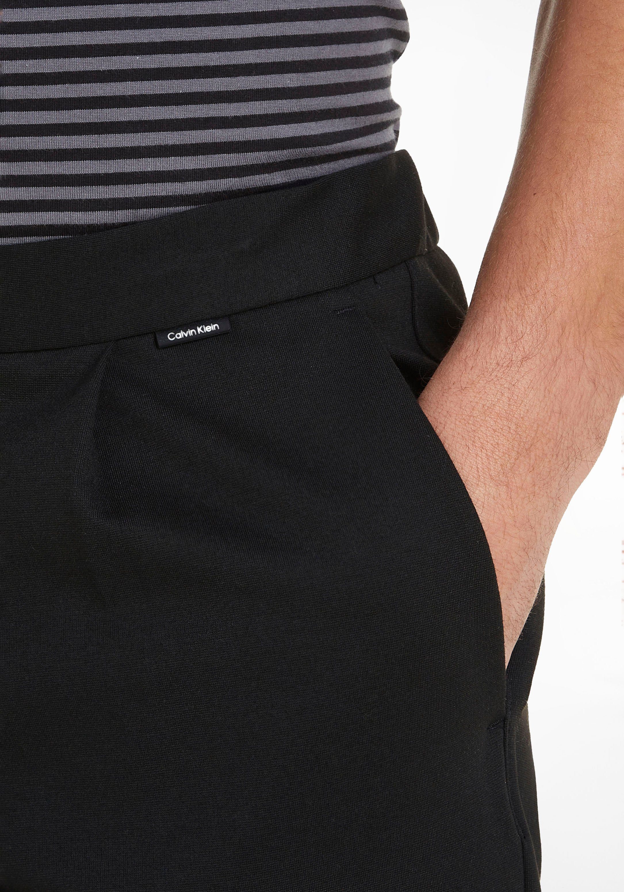 Calvin Klein Chino COMFORT KNIT TAPERED PLEAT