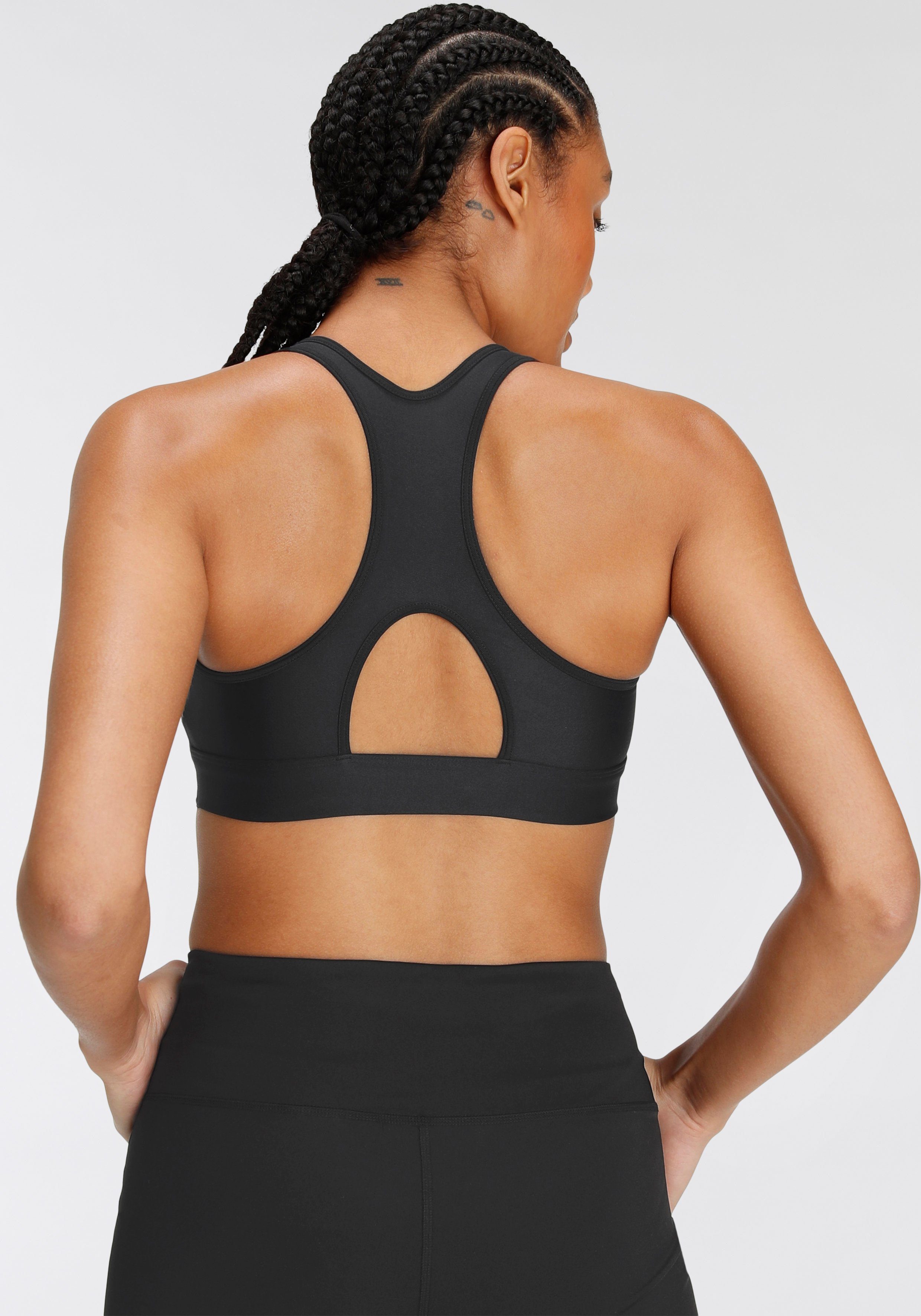 Under Armour® Sport-bh HeatGear® Perfect voor de warme dagen. Houdt je koel en droog.