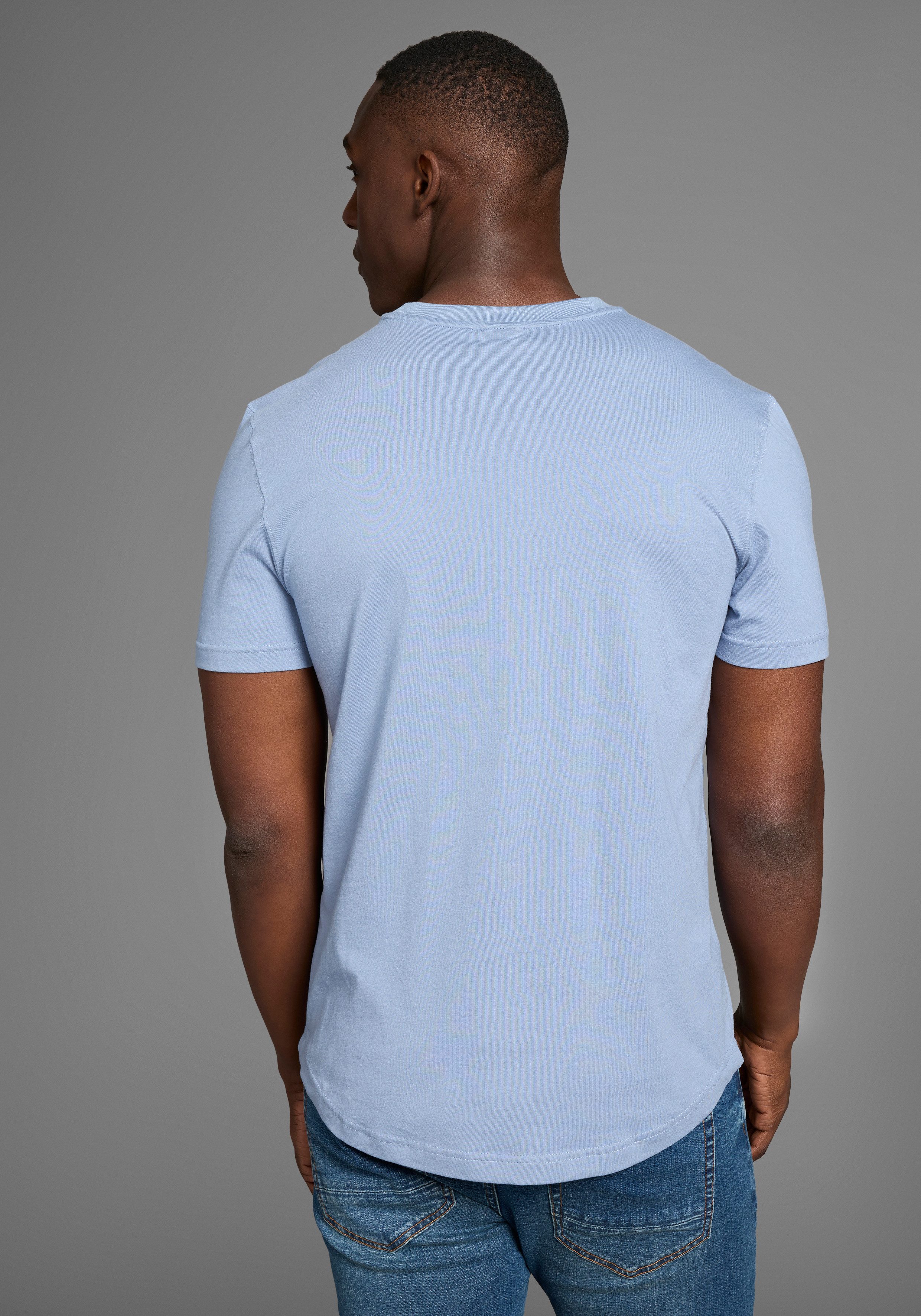 Bruno Banani Lang shirt met een afgeronde zoom