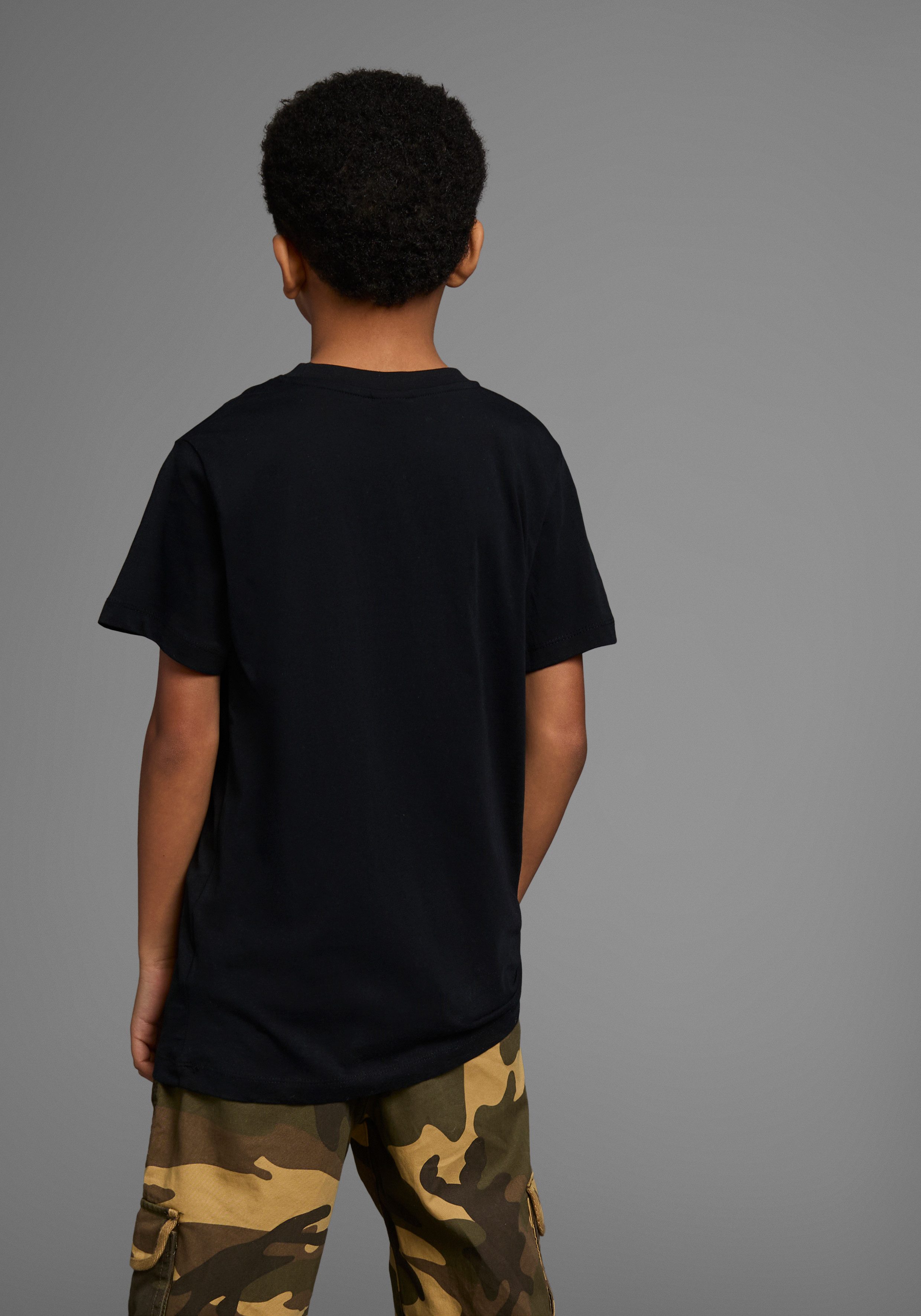 KIDSWORLD T-shirt Met spreuk: LASS UNS: HALT DIE KLAPPEN! SPELEN Korte mouwen, basic pasvorm, met trendy statements en slogans