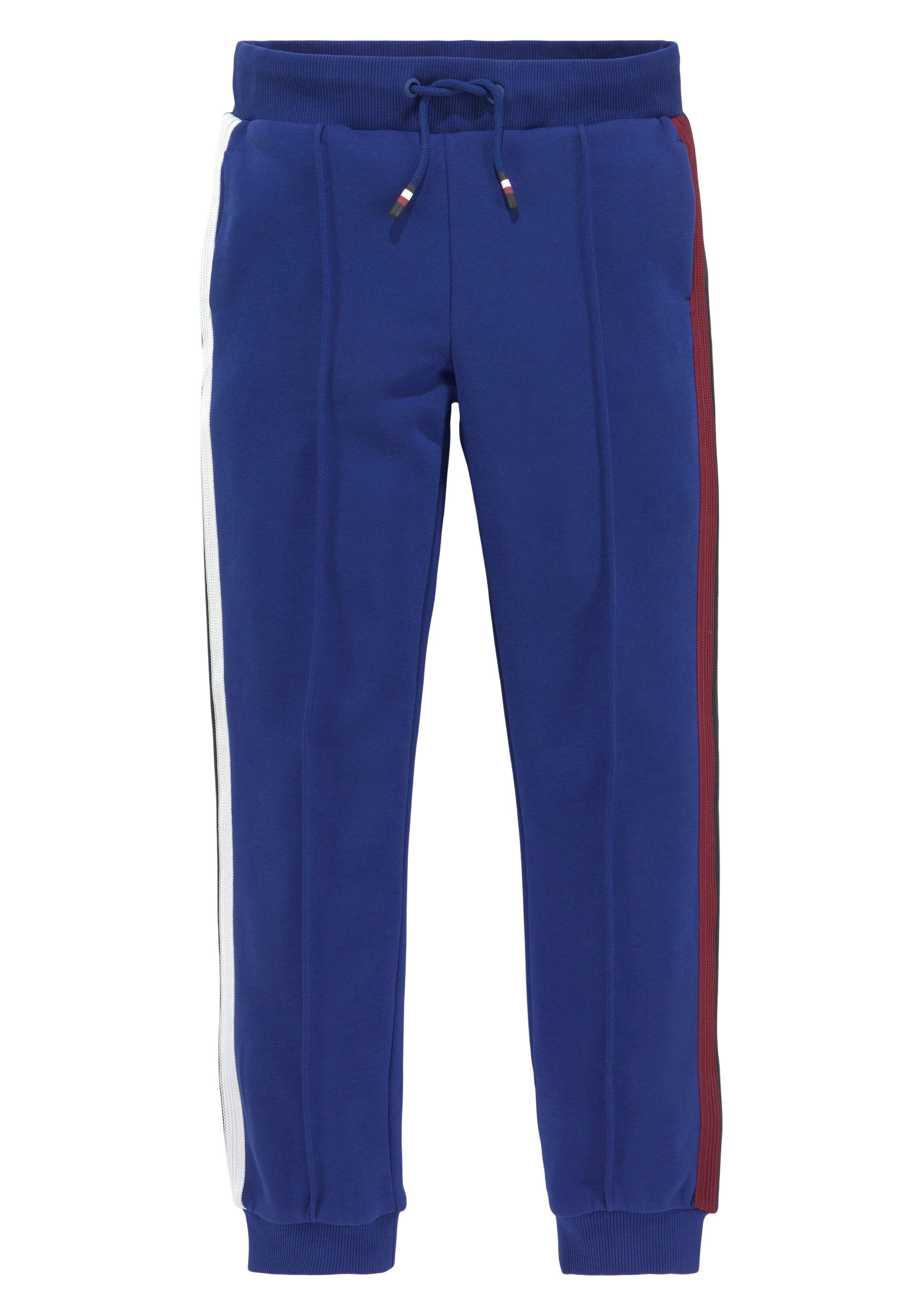 Tommy Hilfiger Sweatbroek GLOBAL STRIPES SWEATPANTS met colorblocking strepen aan de zijnaad
