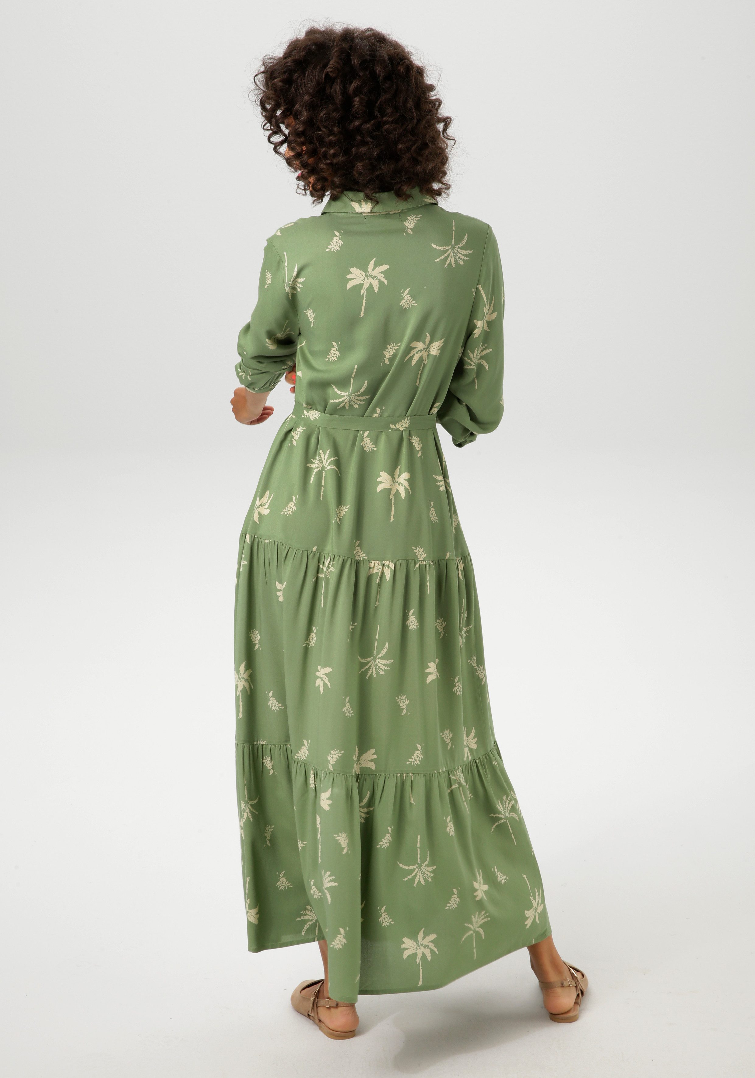 Aniston CASUAL Maxi-jurk met palmen bedrukt - elk stuk is uniek - nieuwe collectie (Met een afneembare bindstrik)