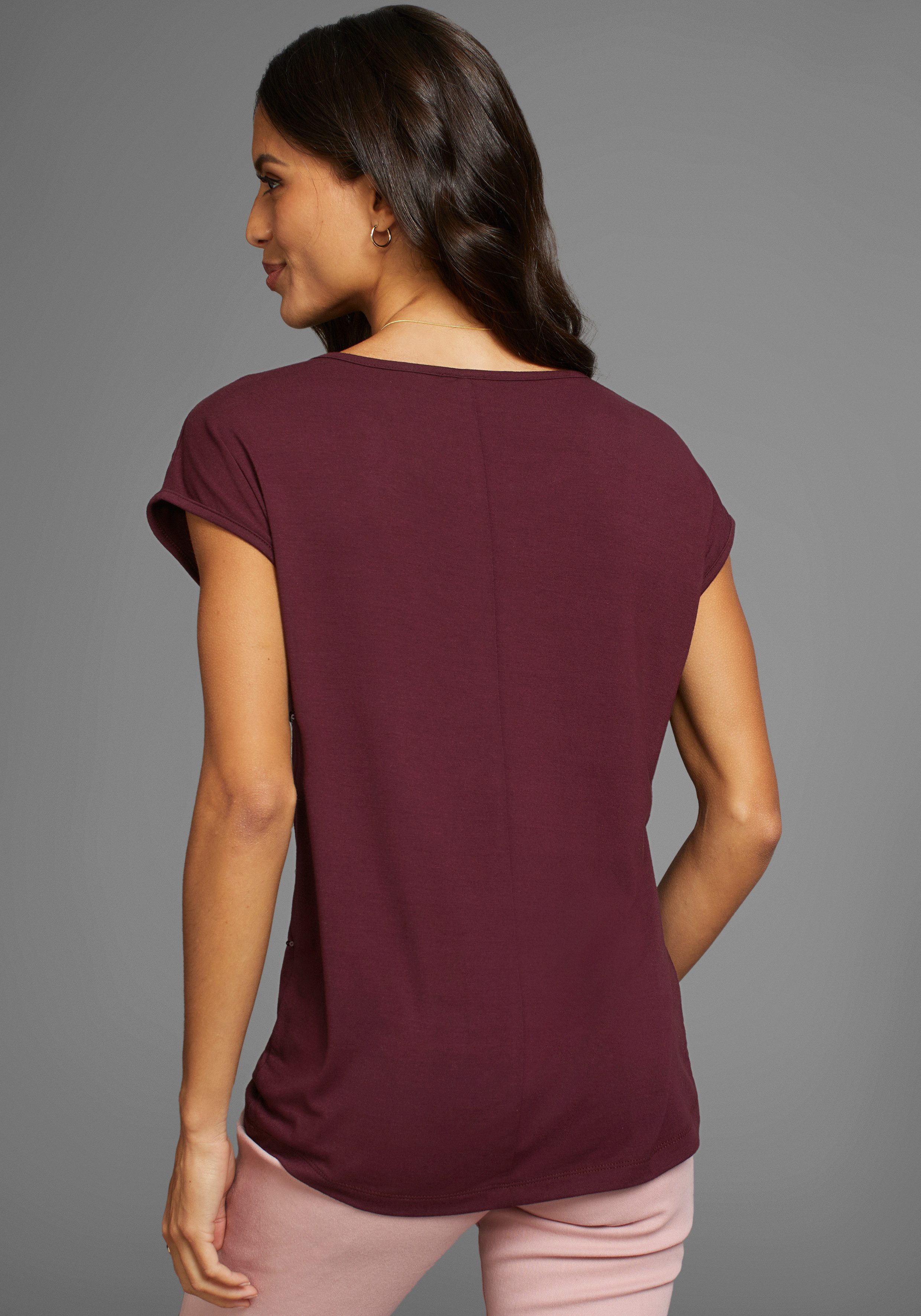 Laura Scott T-shirt mouwloos, heuplang, met glinsterende pailletten