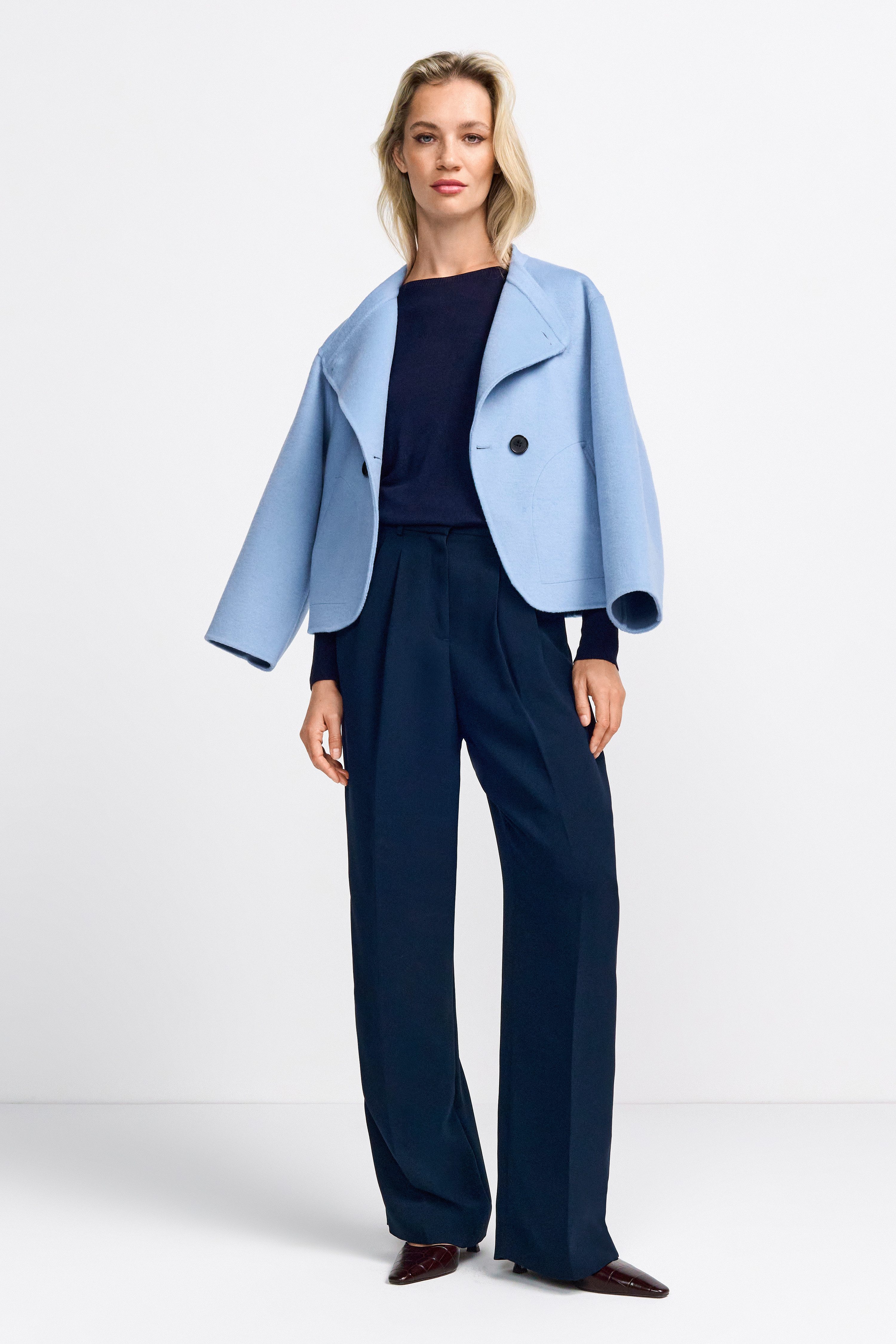 Rich & Royal Pantalon met vouw Met merkenlabel boven de tas