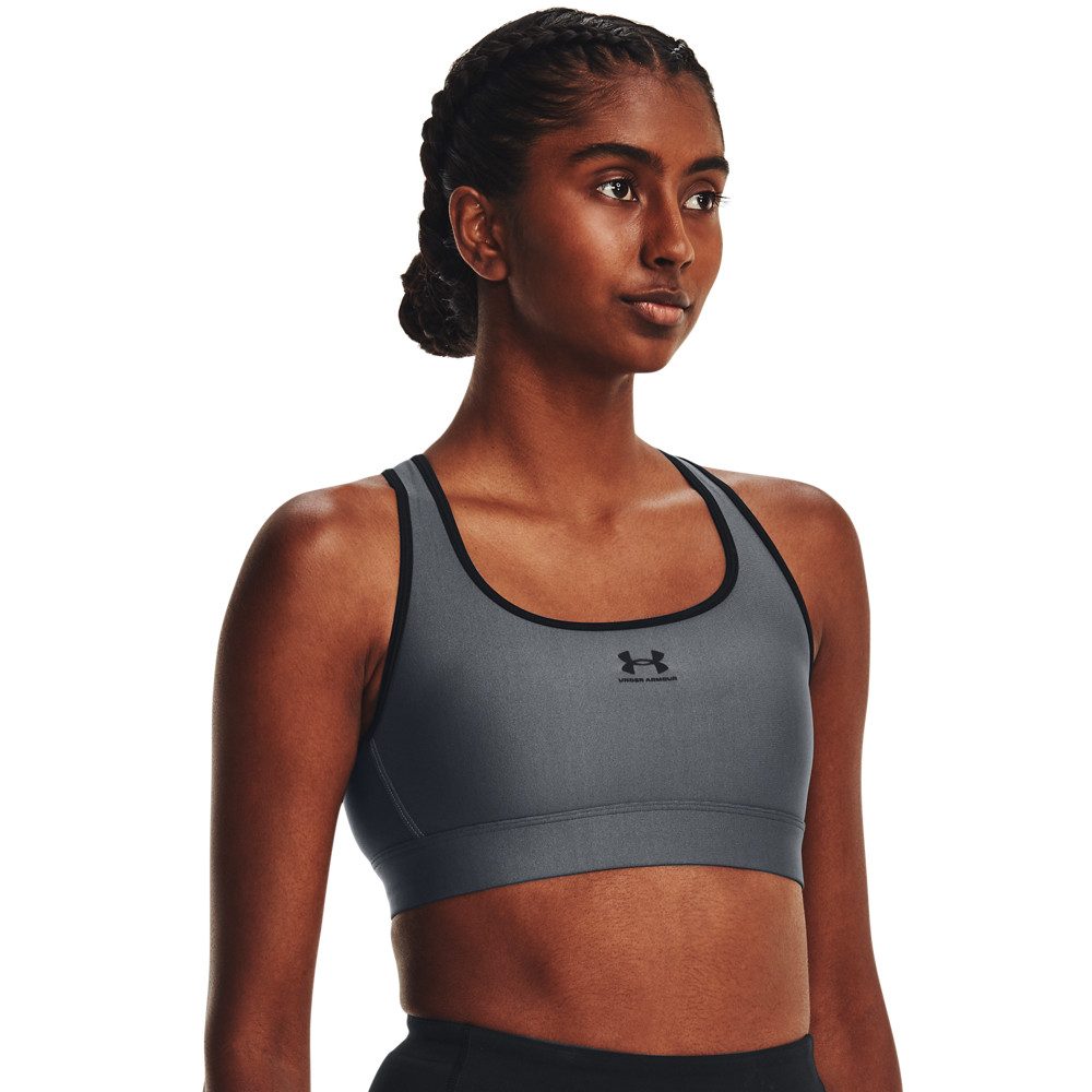 Under Armour® Sport-bh HeatGear® Perfect voor de warme dagen. Houdt je koel en droog.
