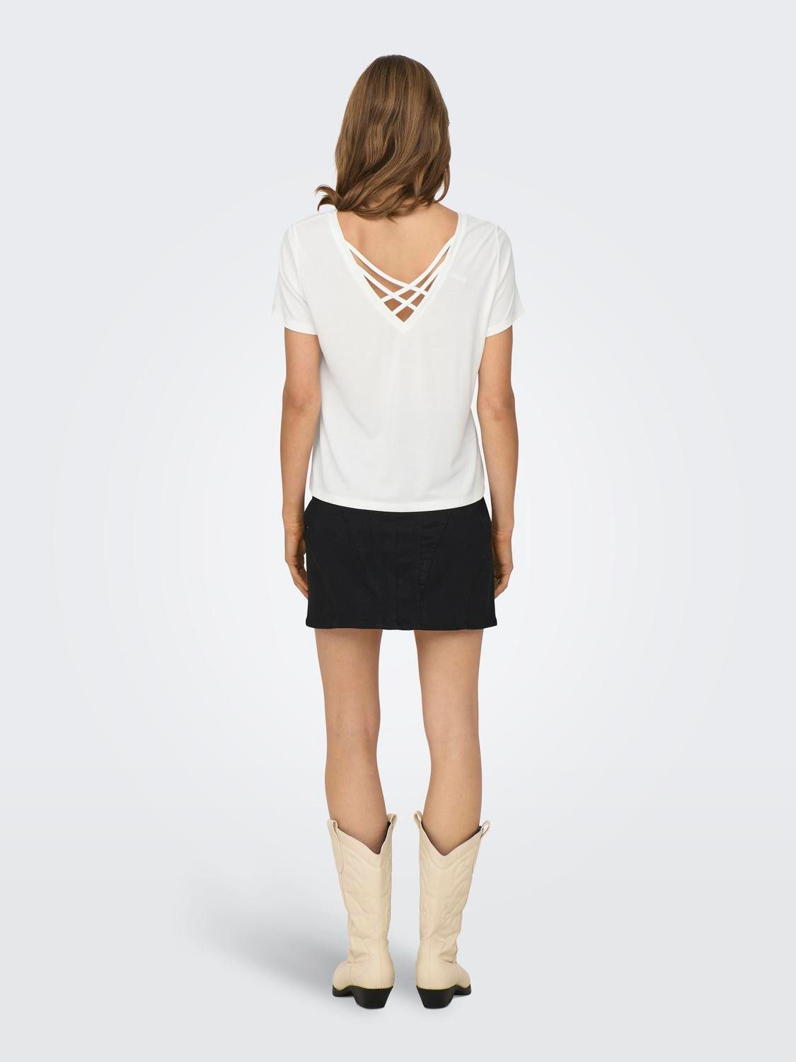 Only Shirt met korte mouwen ONLFREE LIFE S/S CROSS BACK TOP BOX JRS