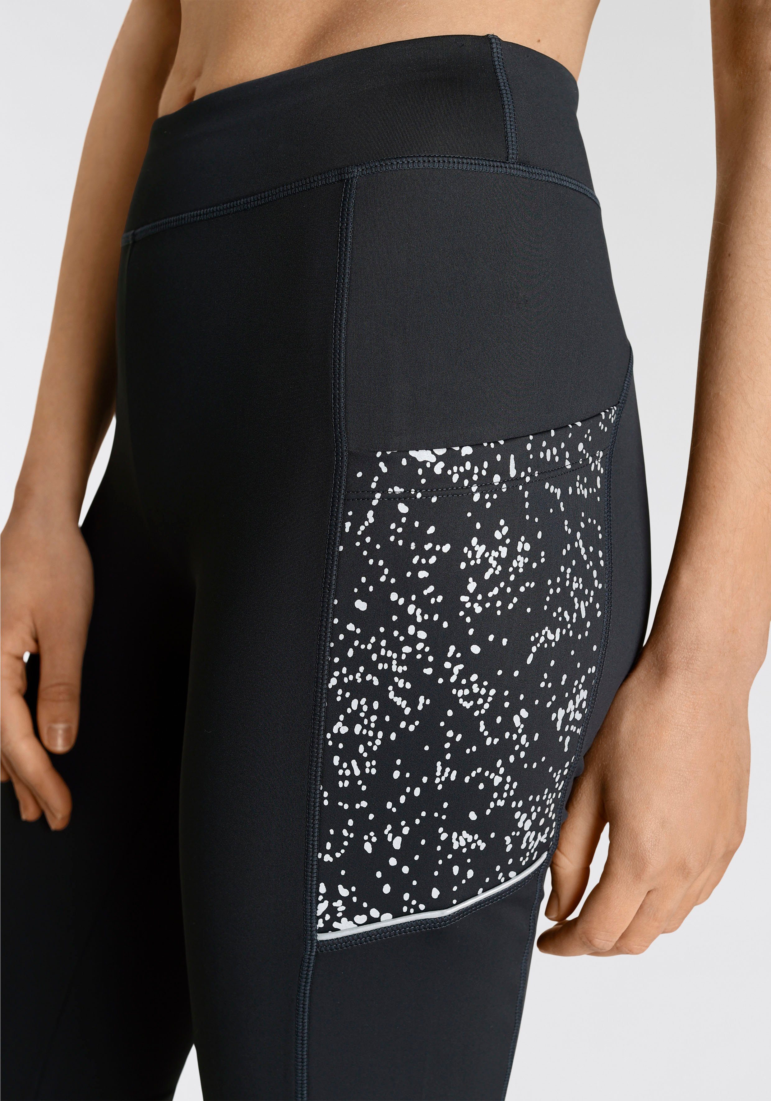 active by Lascana Functionele broek -Sportbroek met reflecterende print en telefoontas