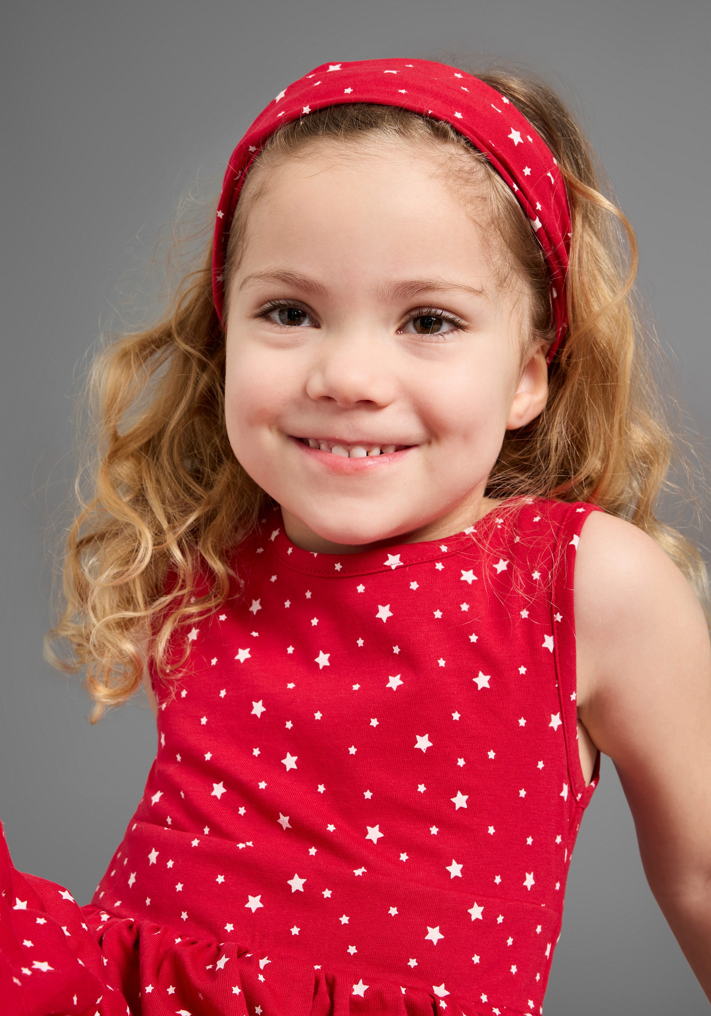 KIDSWORLD Jerseyjurk 2-delig shirtjurk + haarband in schattig sterren-allover feestelijke gelegenheden, knie-lange, speelse stijl, van katoen (set, 2-delig)