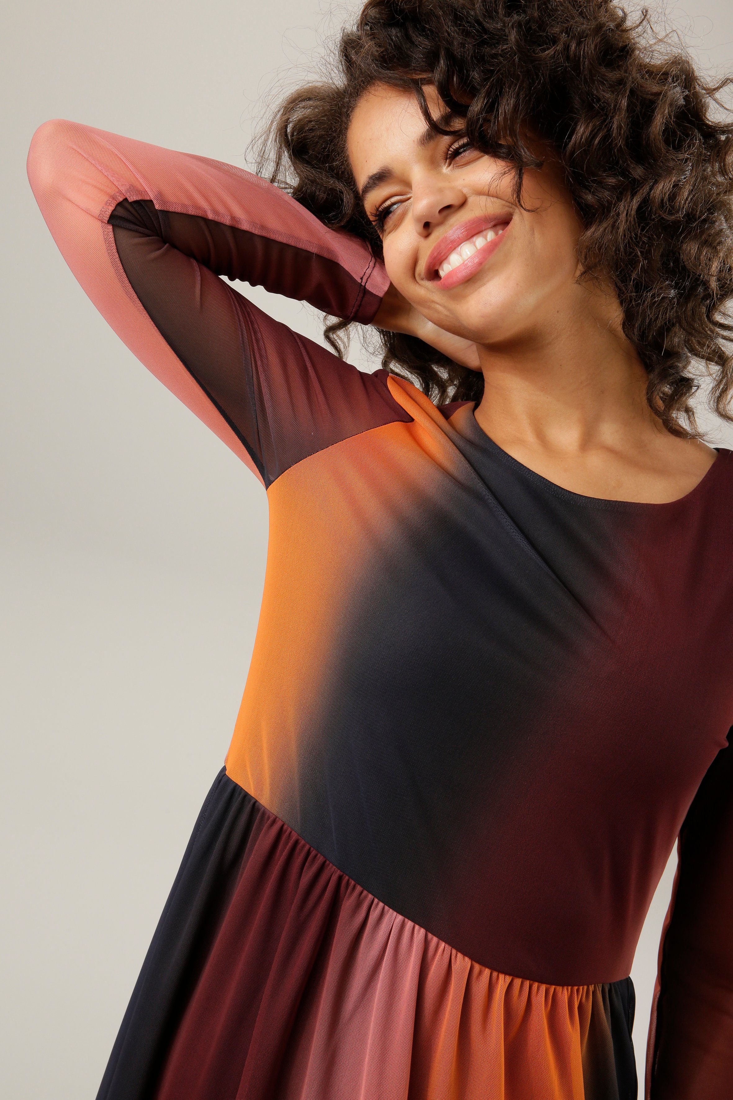 Aniston CASUAL Maxi-jurk in trendy specerij-kleuren met kleurverloop