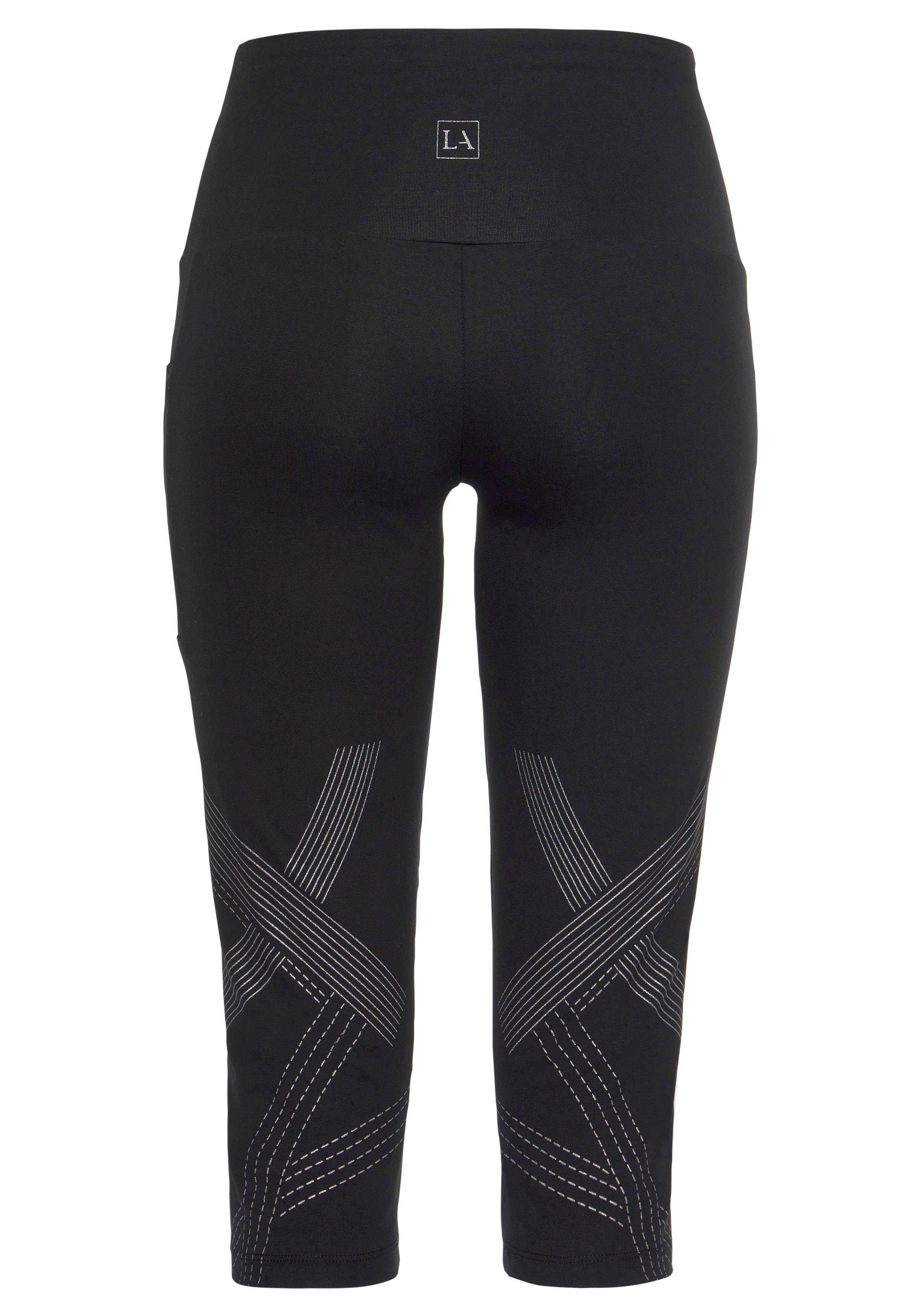 active by Lascana Caprilegging met optisch reflecterende print en tasje voor de mobiele telefoon