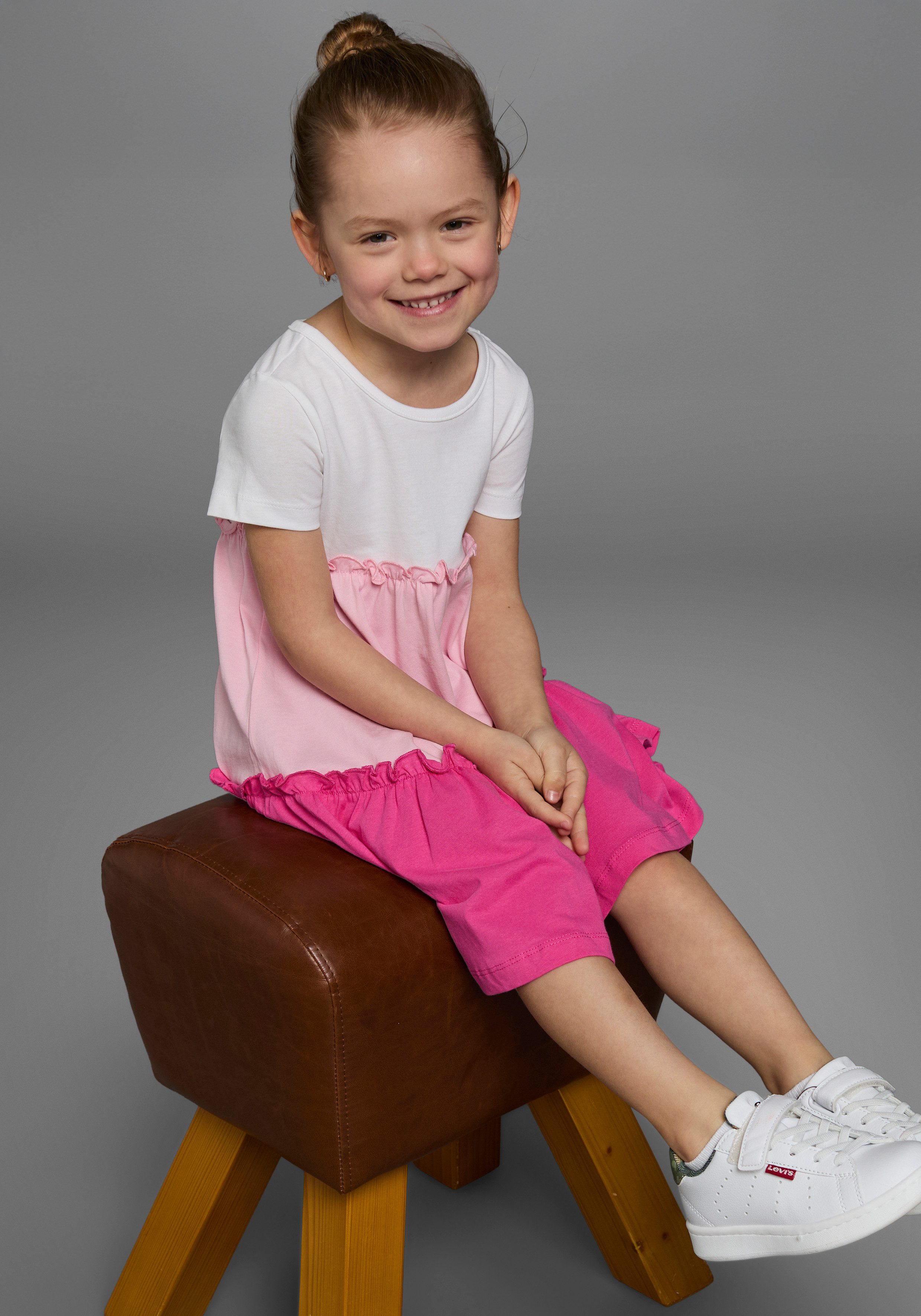 KIDSWORLD Jerseyjurk - Volantjurk voor kleine meisjes feestelijke gelegenheden, knie-vrije lengte, speelse stijl
