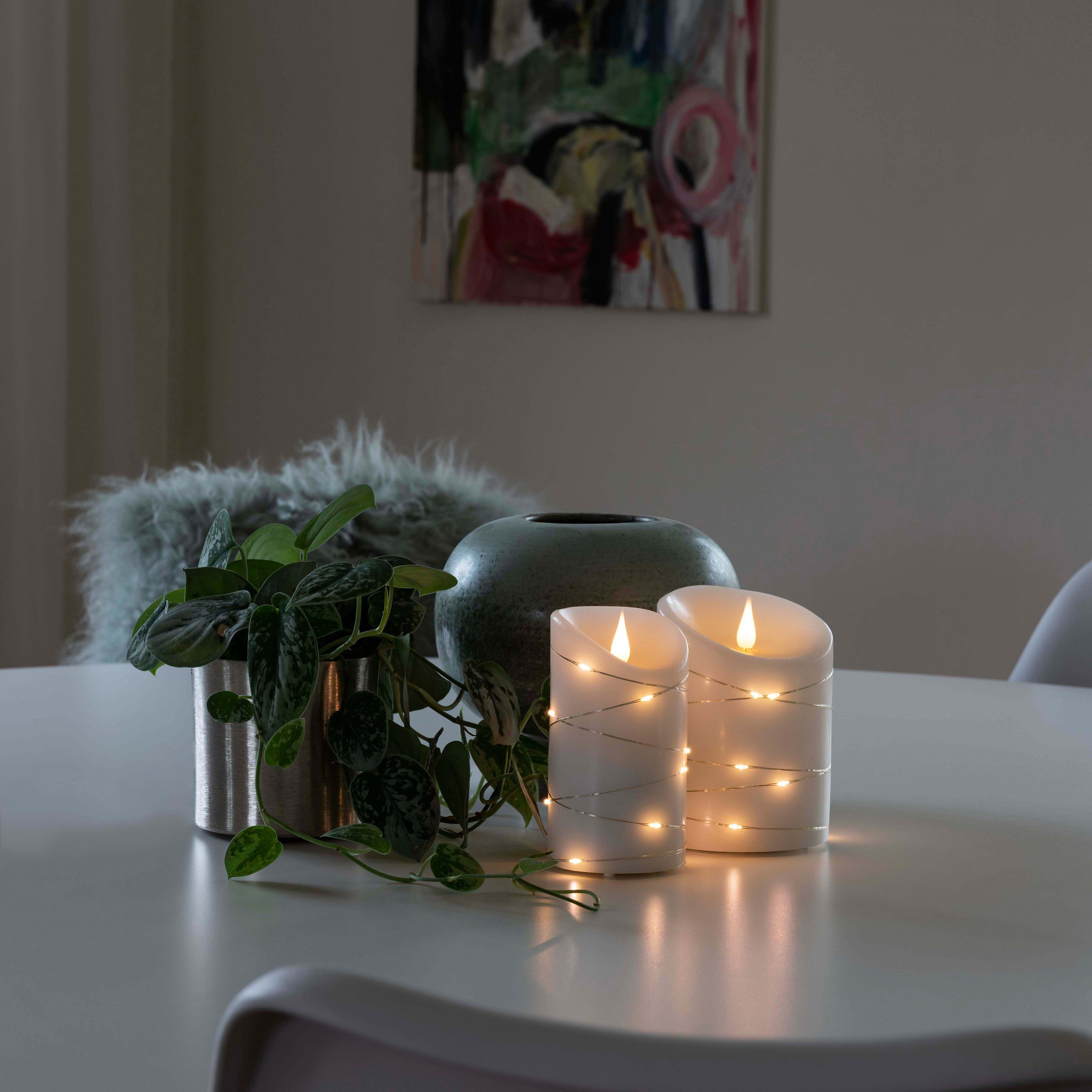 KONSTSMIDE Led-kaars Kerst versiering Ledkaars van echte was, wit, met 3D vlam en zilverkleur. Draad omwikkeld (1-delig)