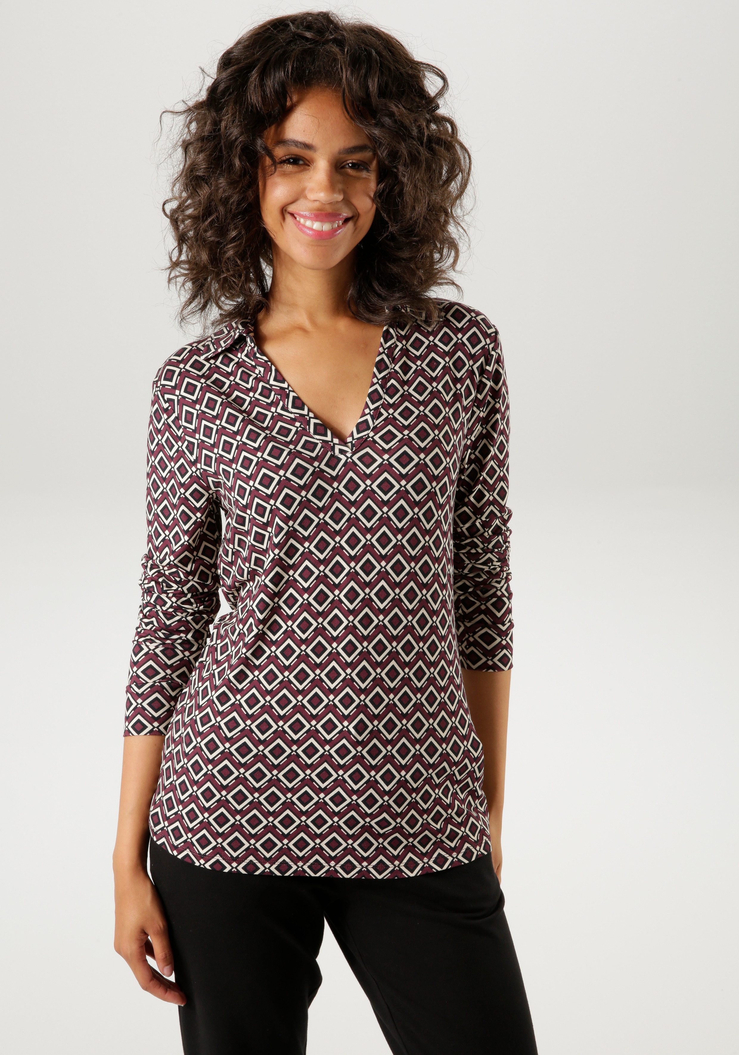 Aniston CASUAL Shirtblouse met trendy kleuren retro-patroon