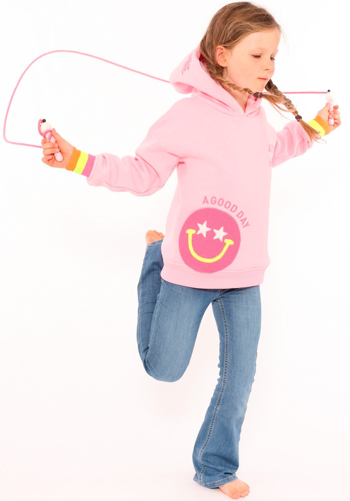 Zwillingsherz Hoodie Always Happy Kids met grote smiley en neonkleurige details