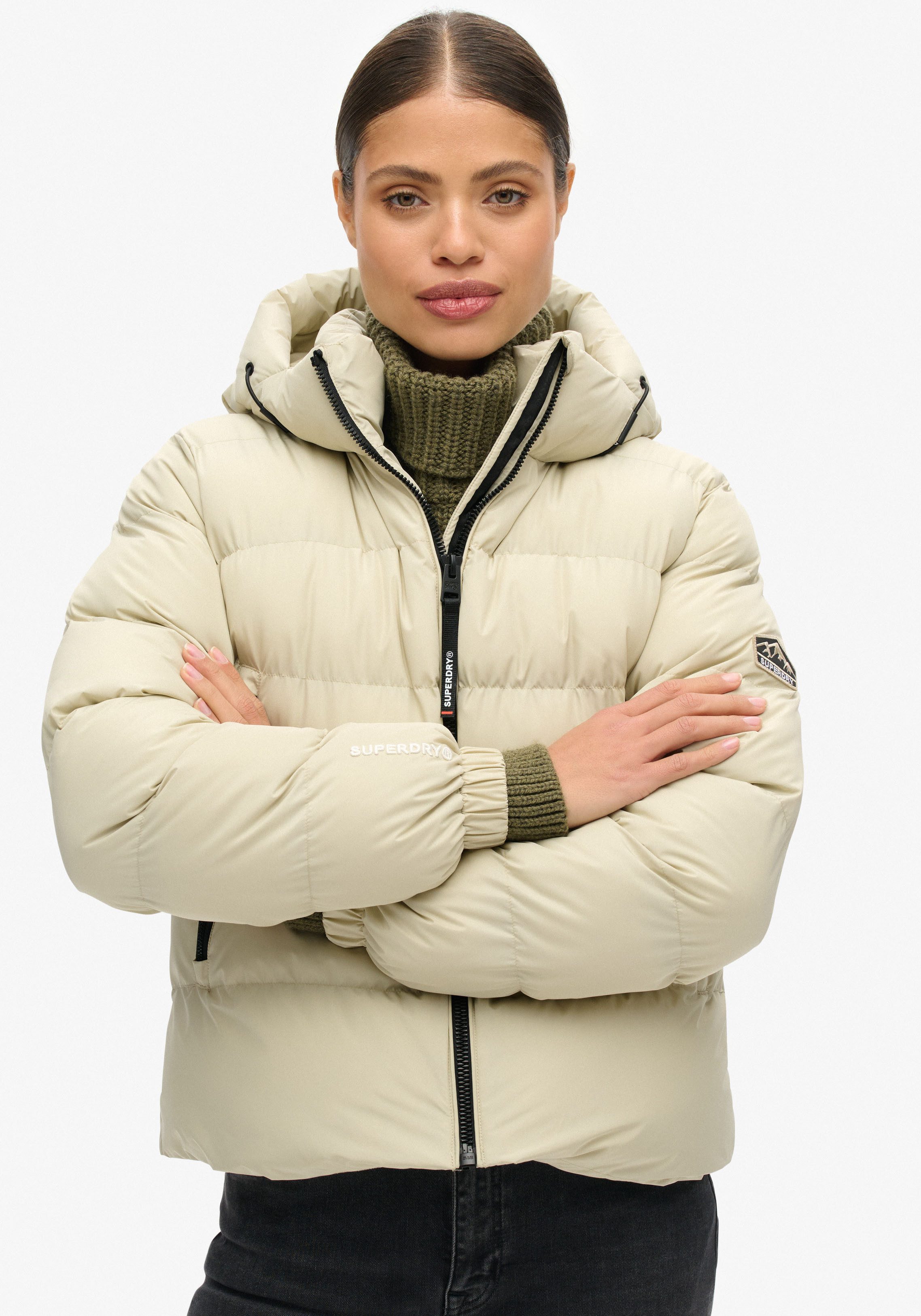Superdry Gewatteerde jas HOODED SPORTS PUFFER JACKET dames donsjassen maat M beige