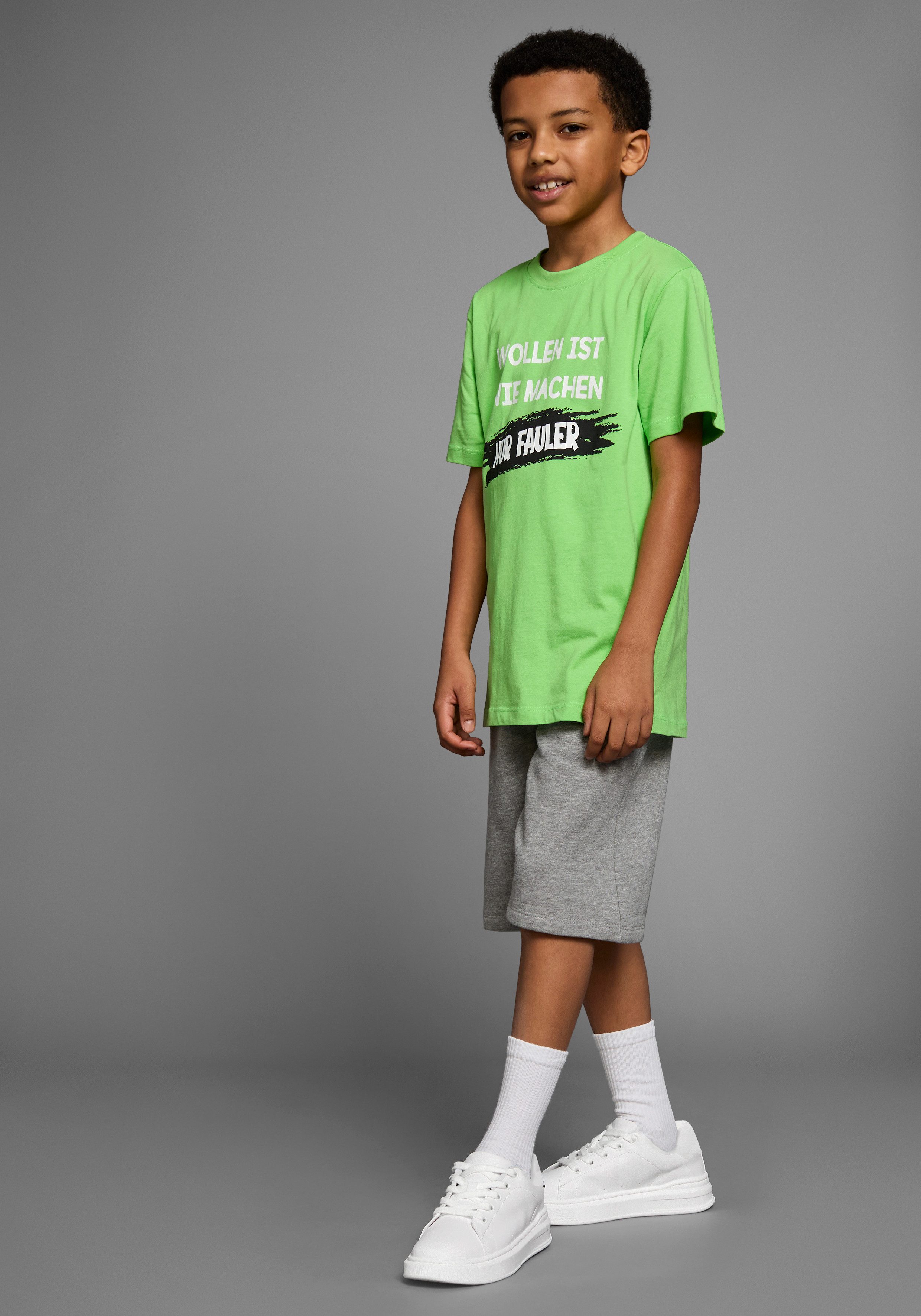 KIDSWORLD T-shirt Met spreuk: WOLLEN IST WIE MACHEN.... Korte mouwen, basic pasvorm, bedrukt, ronde hals
