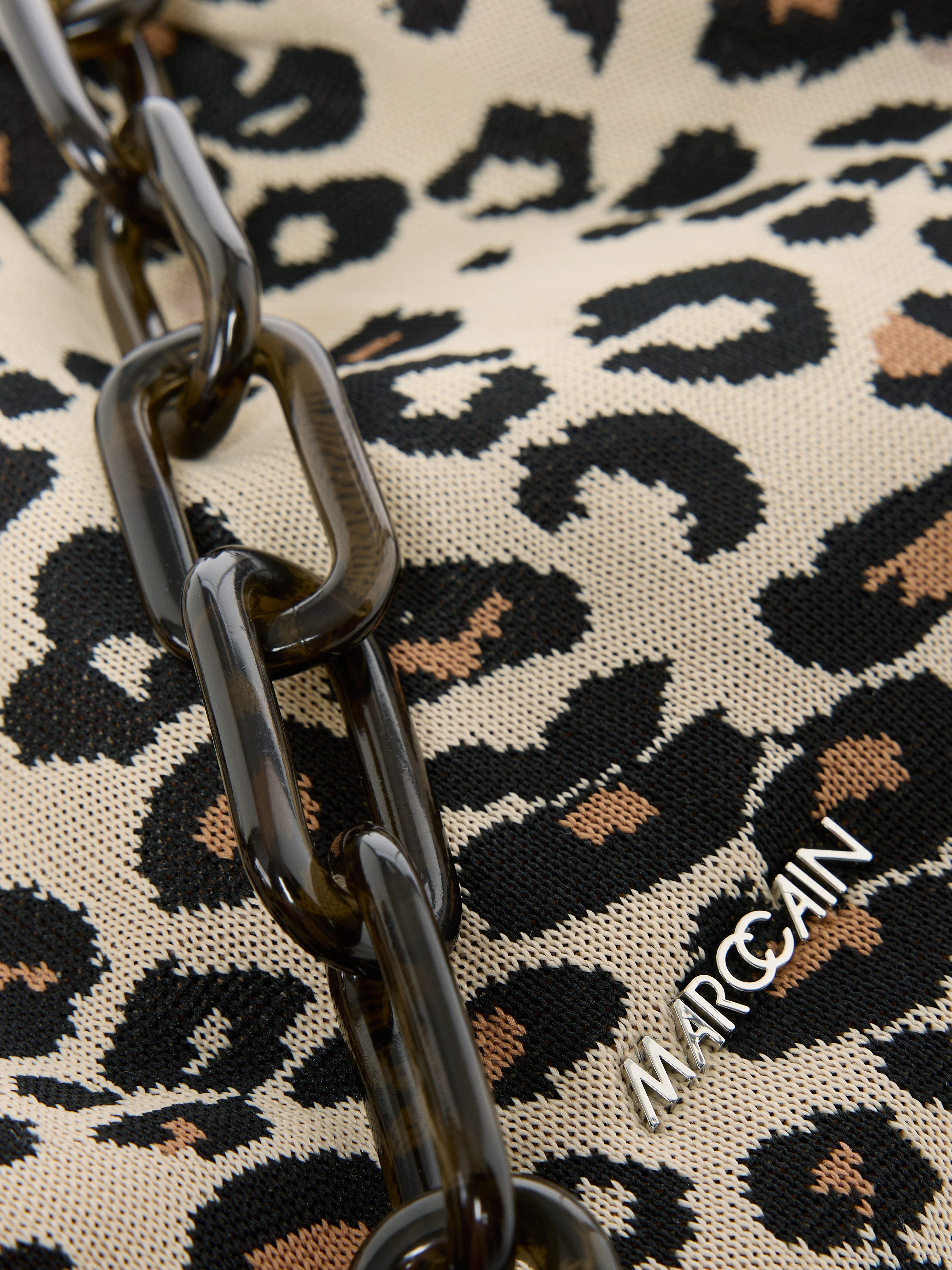 Marc Cain Clutch Collections Feminine Rigour