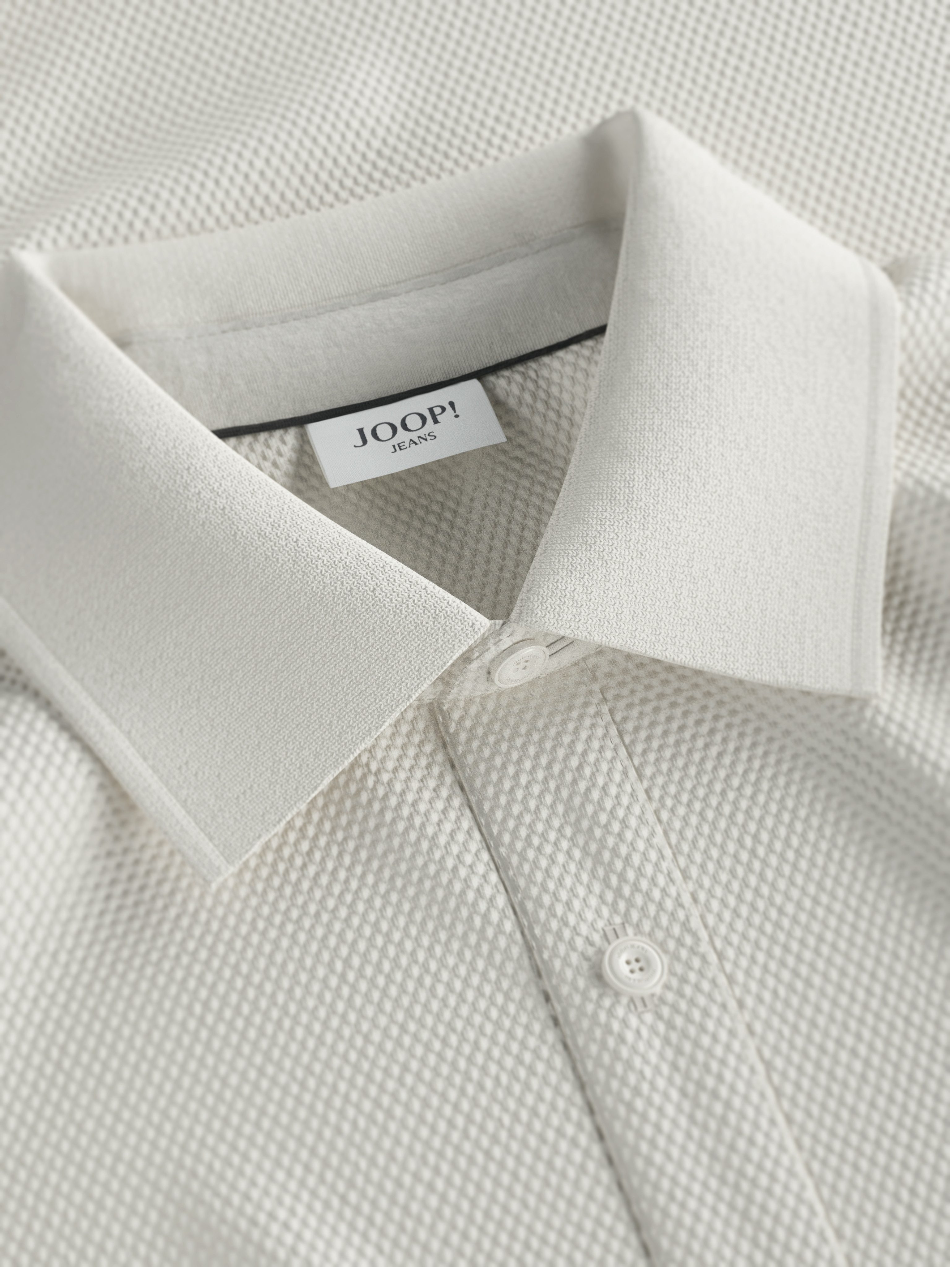 Joop Jeans Poloshirt Amare met gestreepte details aan de mouwen