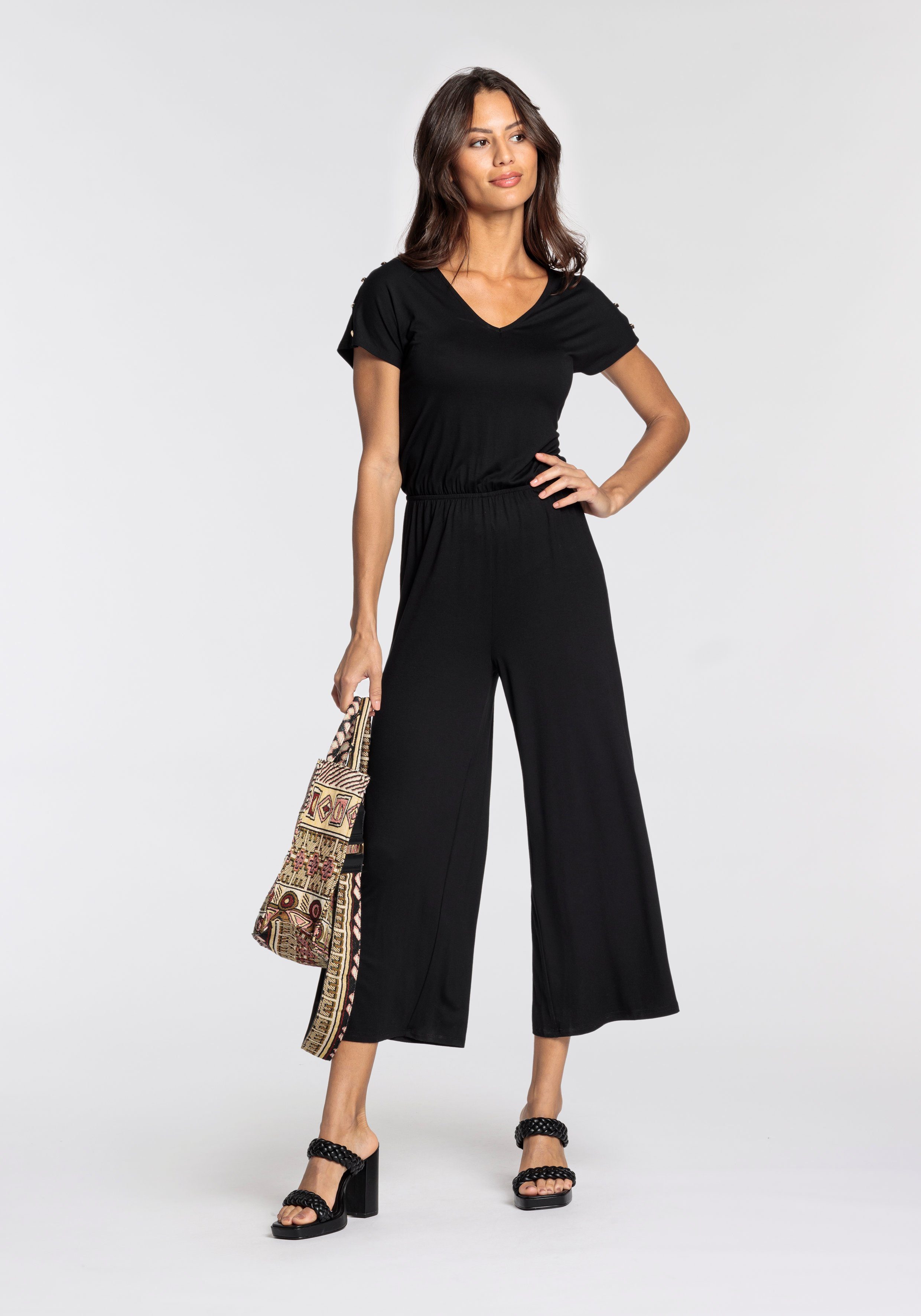 Laura Scott Jumpsuit met moderne knoopsluiting - nieuwe collectie