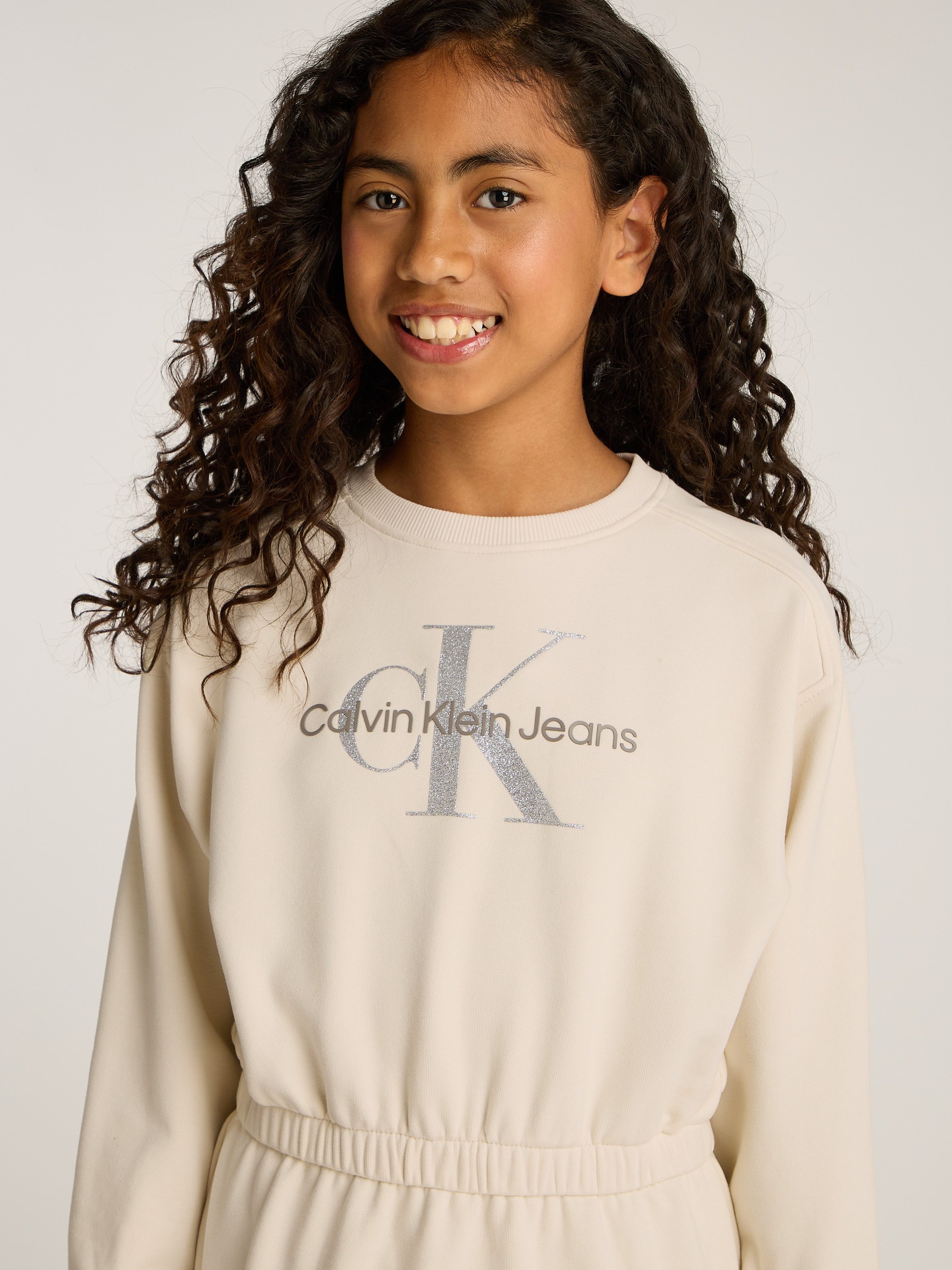 Calvin Klein Sweatjurk GLITTER MONOLOGO HWK DRESS voor kinderen tot 16 jaar met logo-opdruk