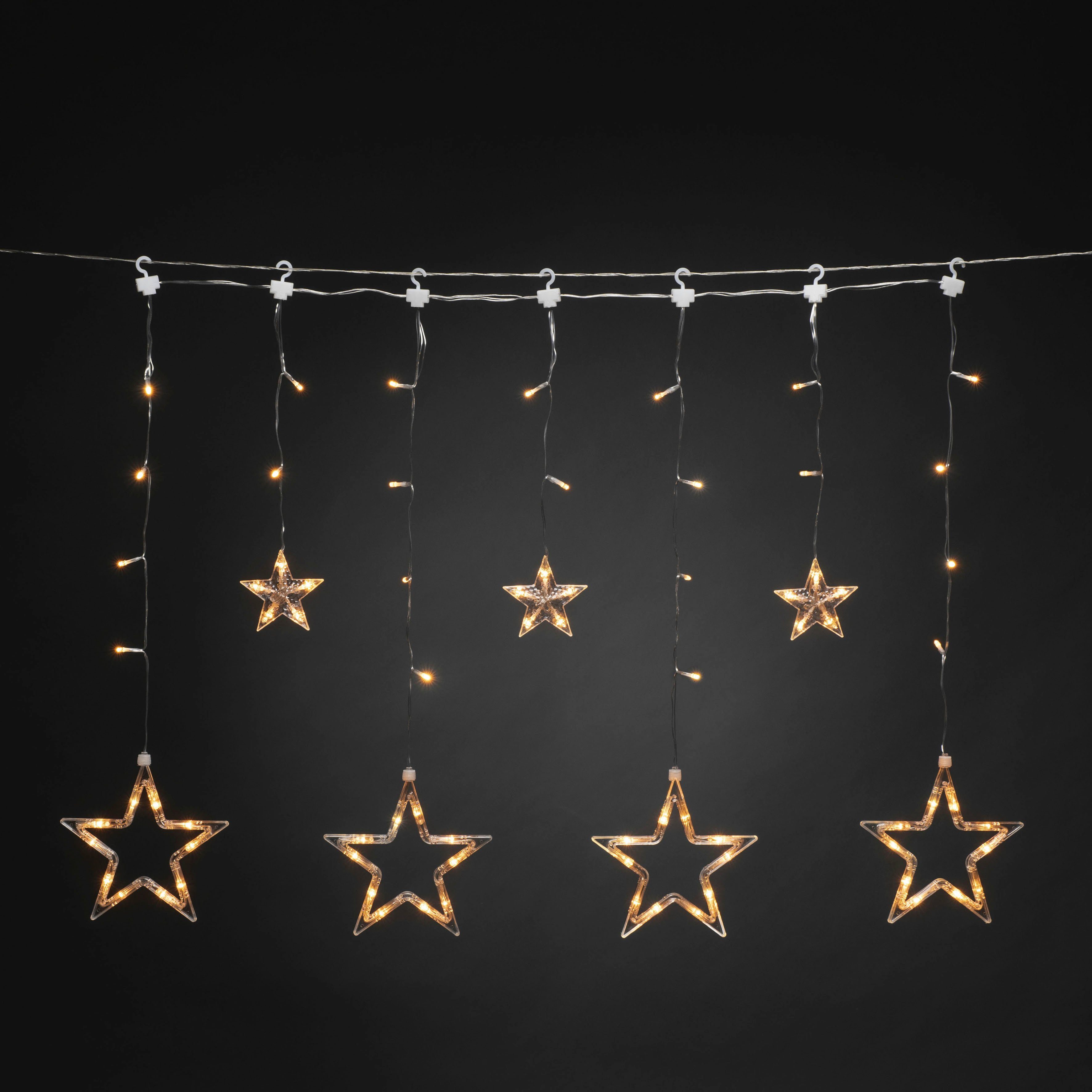 KONSTSMIDE Led-lichtgordijn LED zonne-ster lichten gordijn, 77 amberkleurige diodes Afstandsbediening, 8 lichtfuncties, timer, zonnebox oplaadbaar via USB (2 stuks)