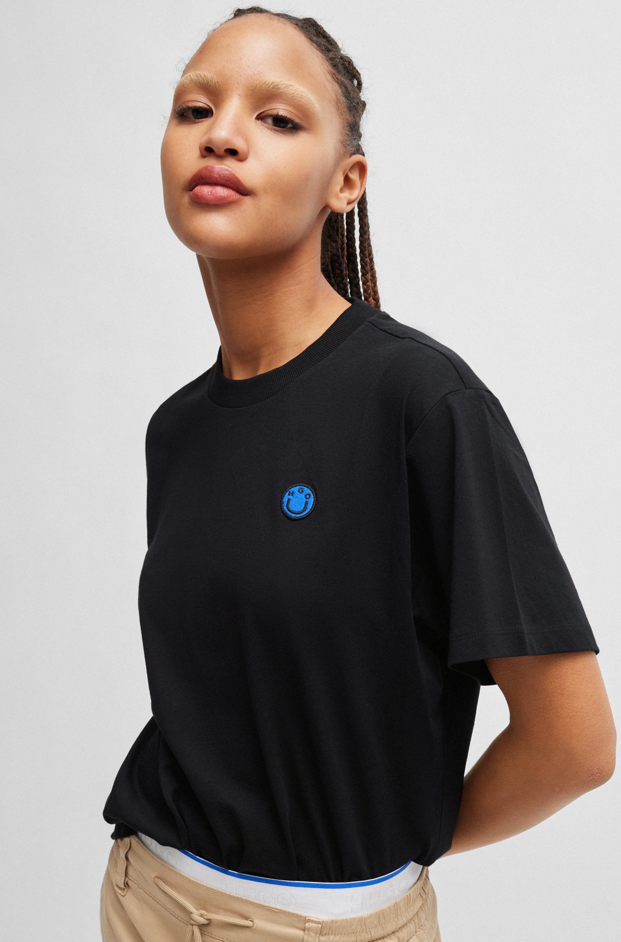HUGO Blue T-shirt Vintage Tee met logo-badge