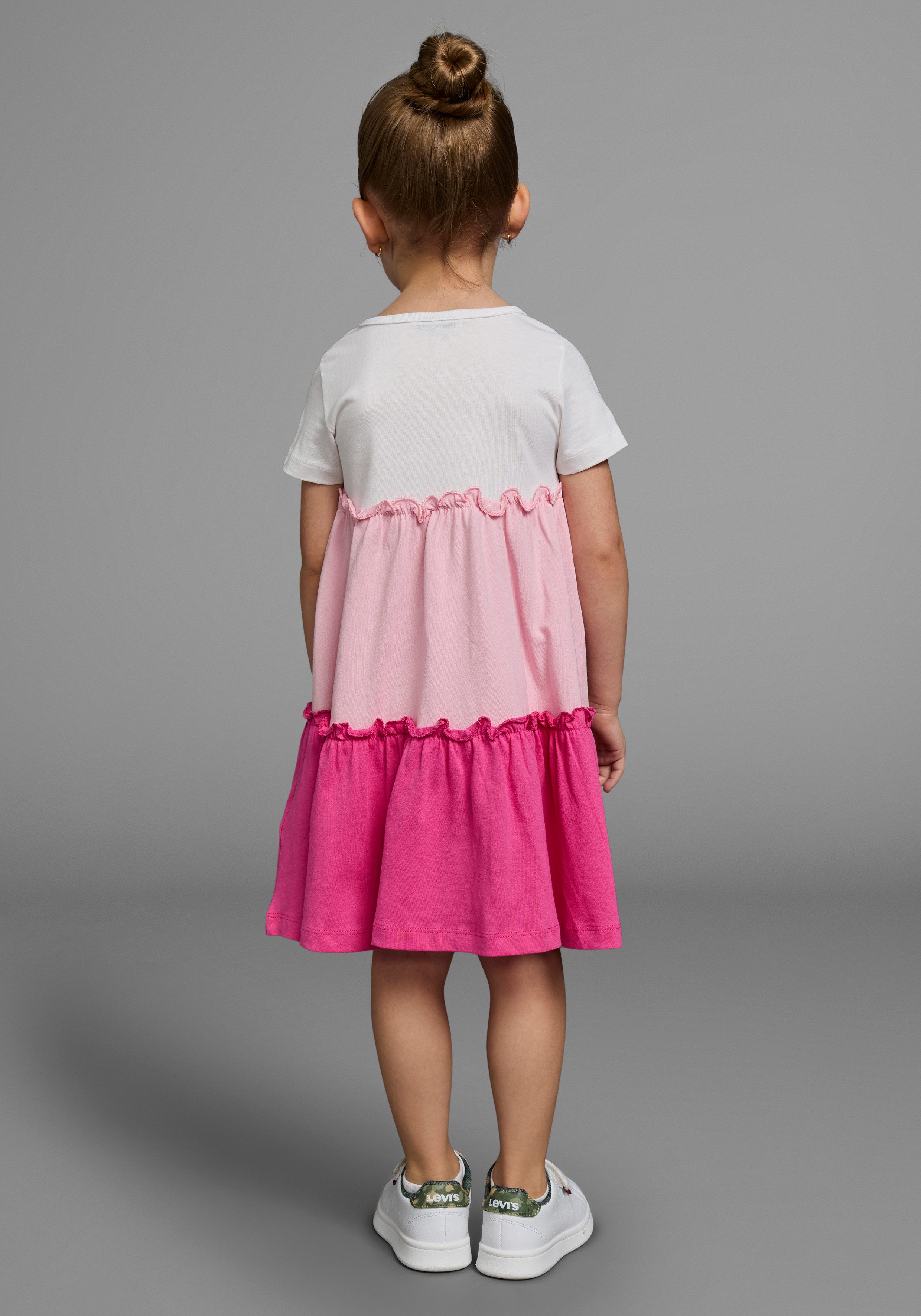 KIDSWORLD Jerseyjurk - Volantjurk voor kleine meisjes feestelijke gelegenheden, knie-vrije lengte, speelse stijl