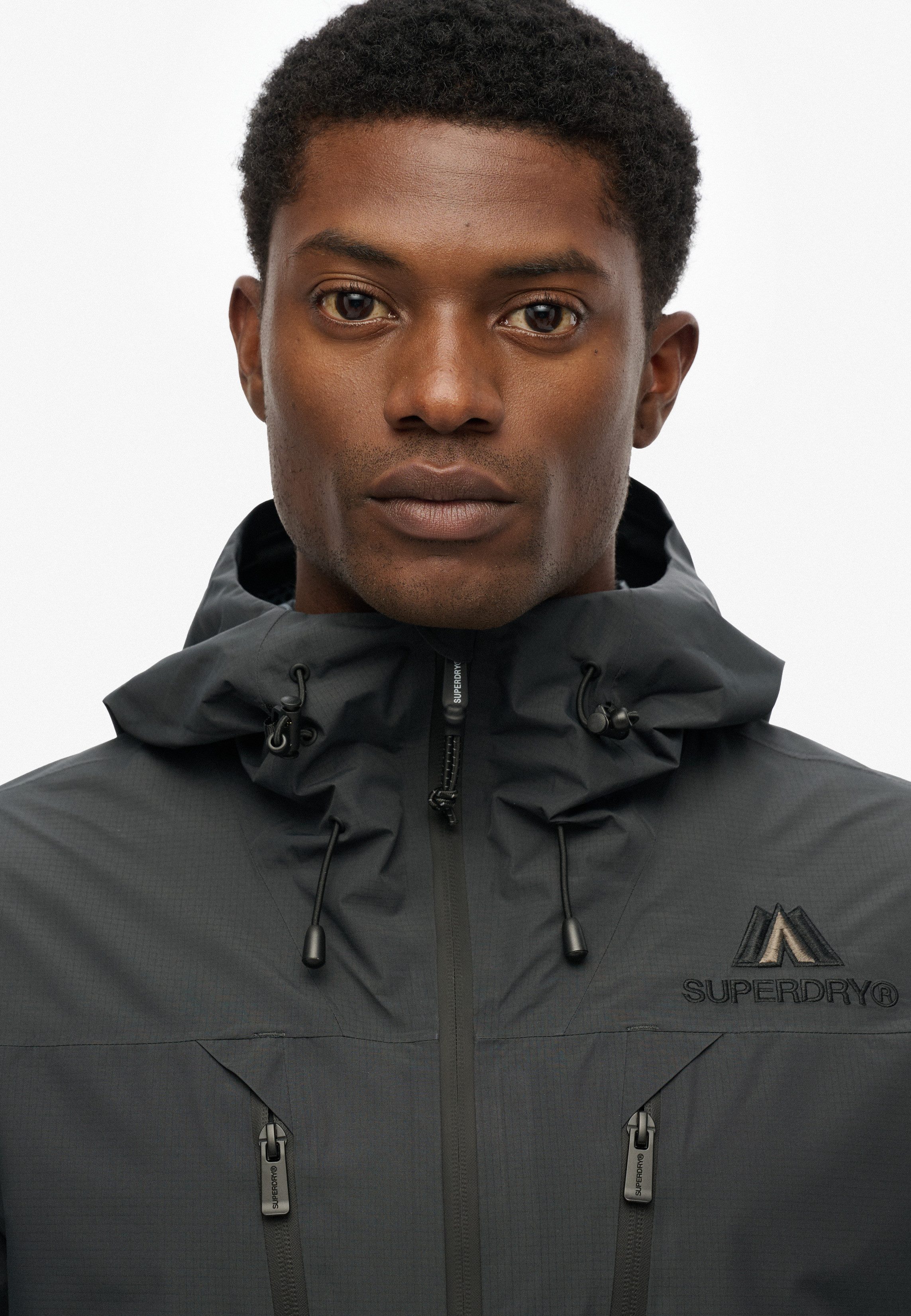 Superdry Outdoorjack WATERPROOF JACKET Waterdicht (kolom wordt later geleverd)