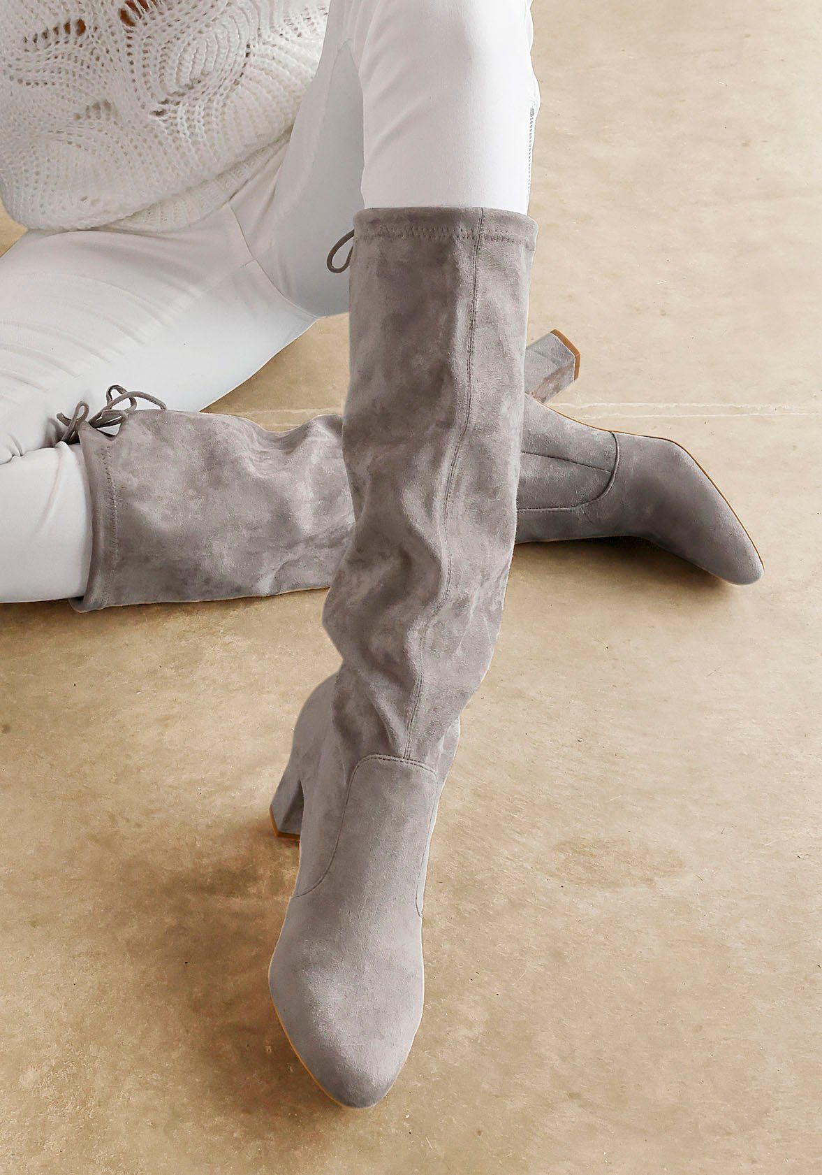Lascana Instaplaarzen Slip-on boots, slouchy boots, slip-on, stretch & blokhak