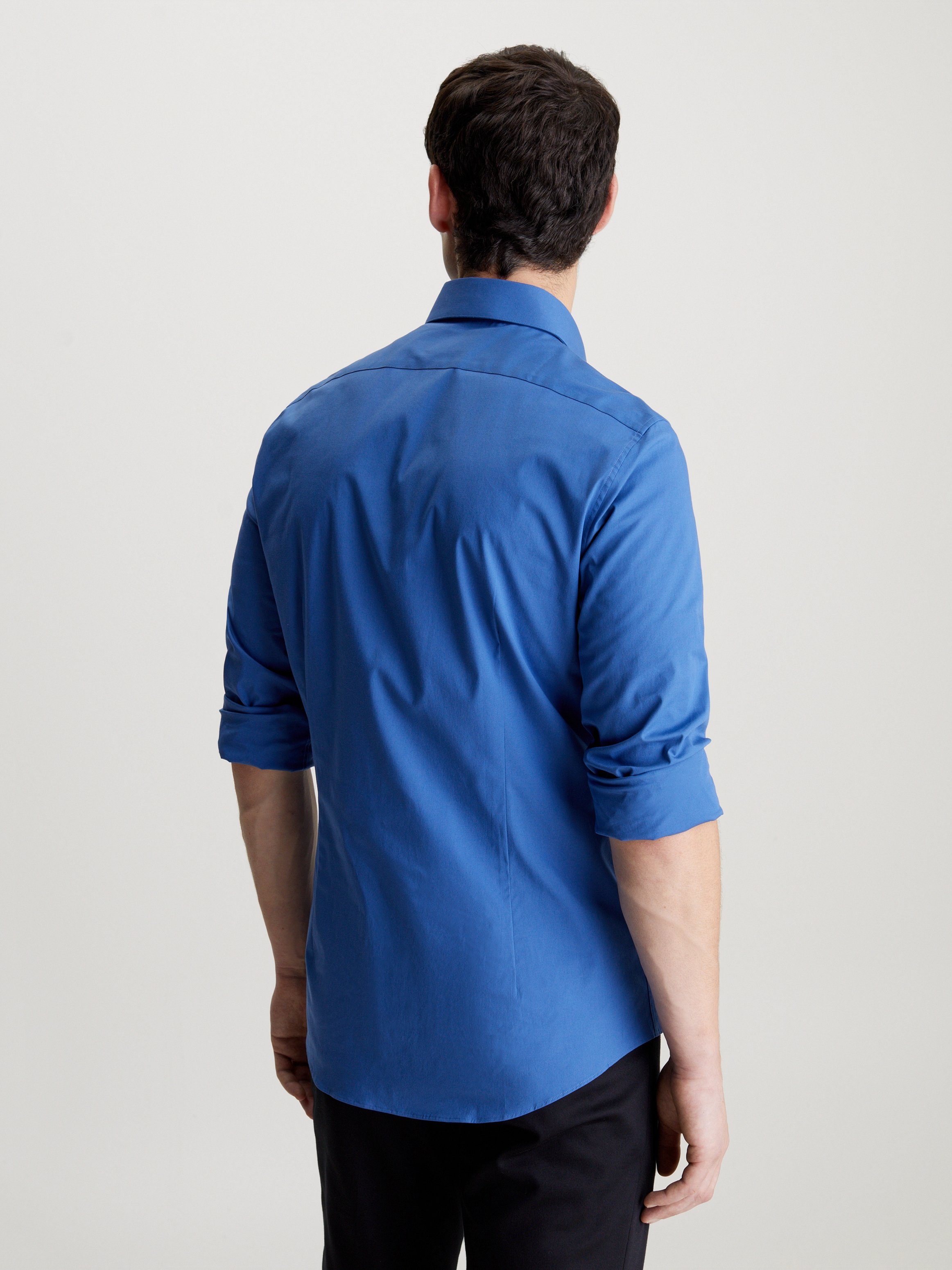 Calvin Klein Businessoverhemd POPLIN STRETCH SLIM SHIRT met kent-kraag, logoprint op borsthoogte