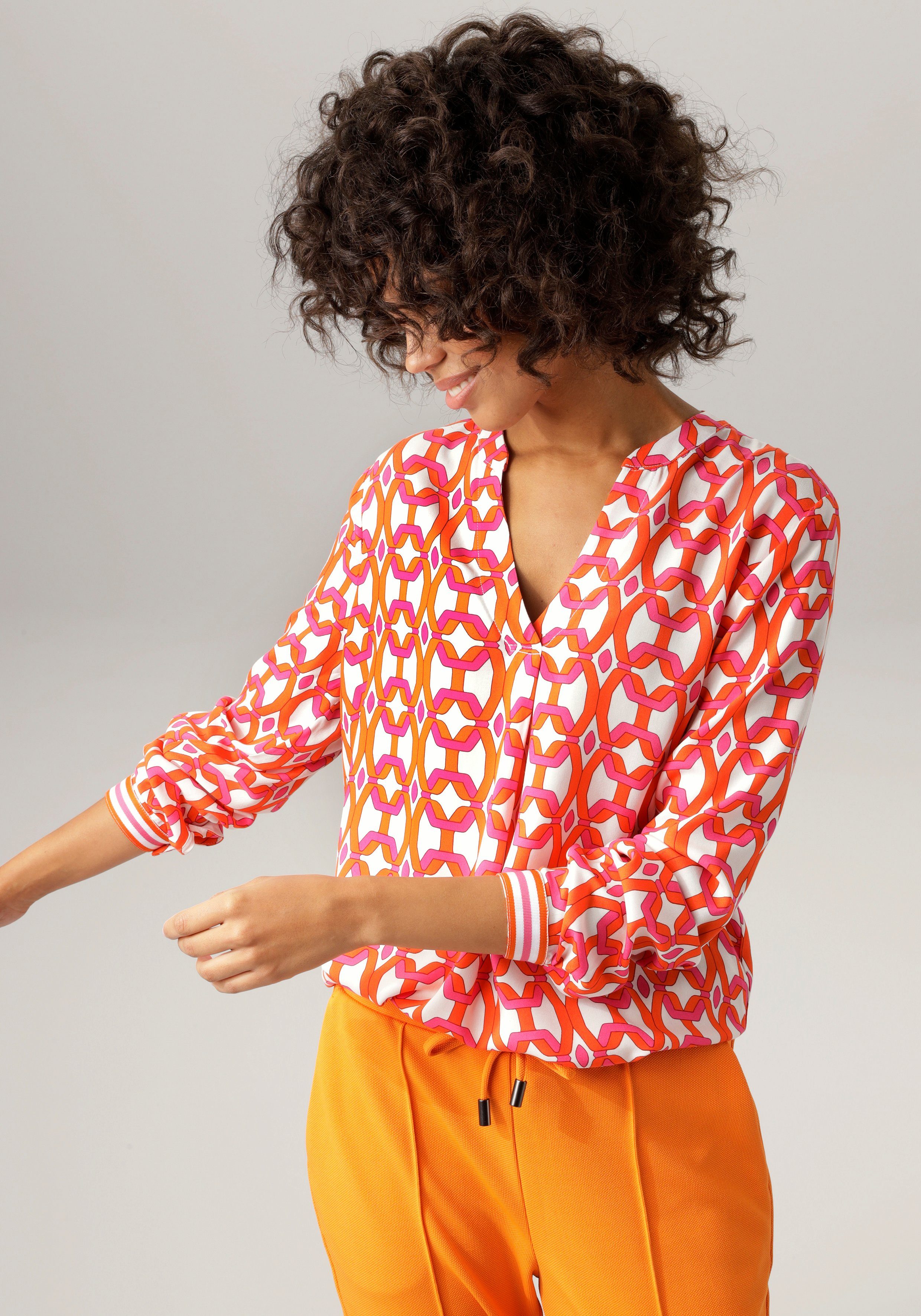 Aniston CASUAL Blouse zonder sluiting met opvallende, grafische print