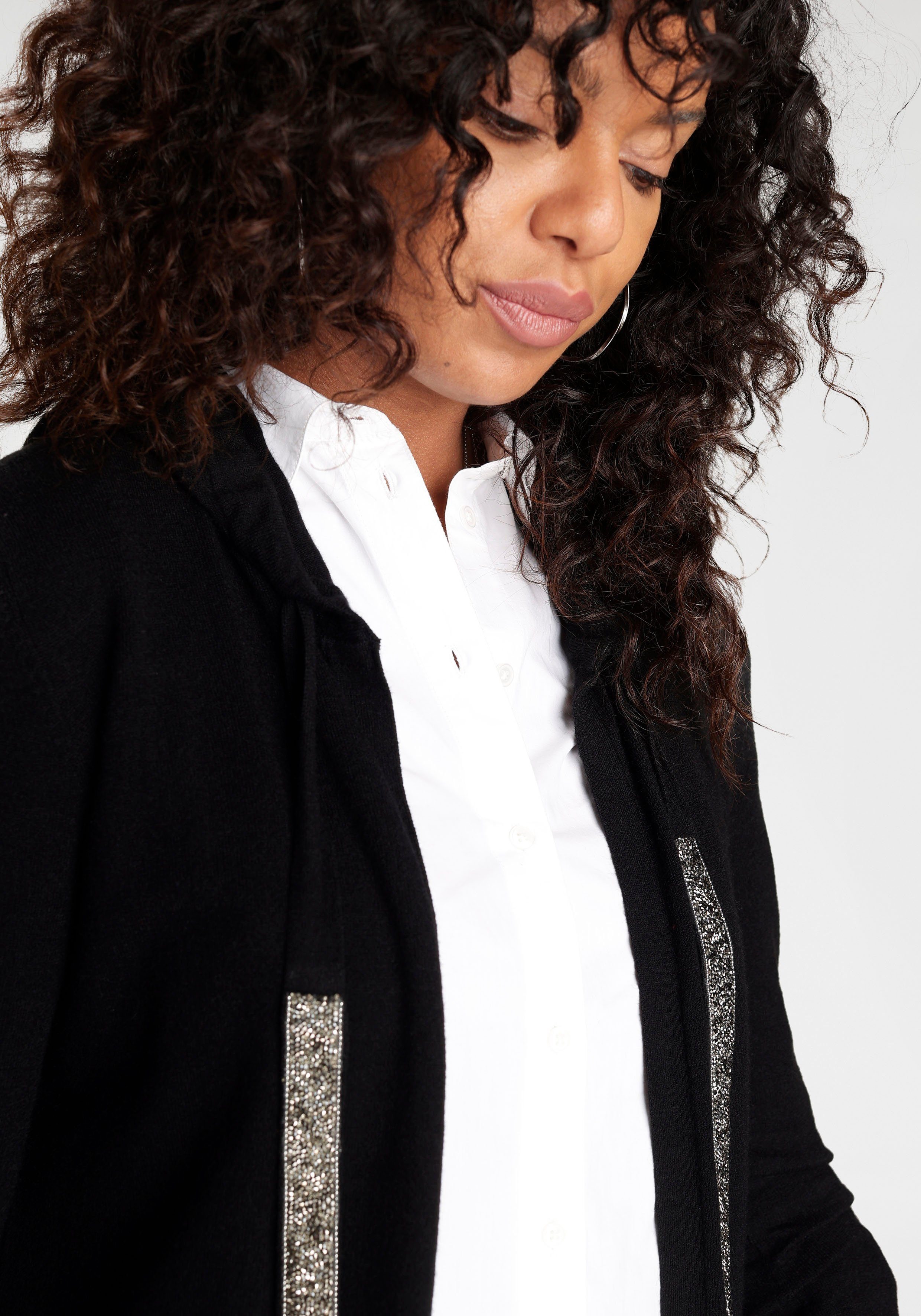 Laura Scott Capuchonvest met glitterbanden
