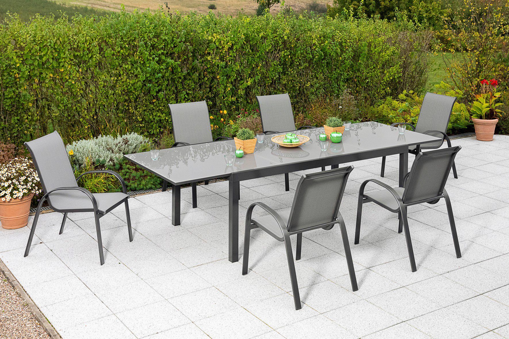 MERXX Tuin-eethoek Amalfi 6 stapelstoelen, uitschuifbare tafel 110 x 200-300 cm (set, 7-delig) tuinsets