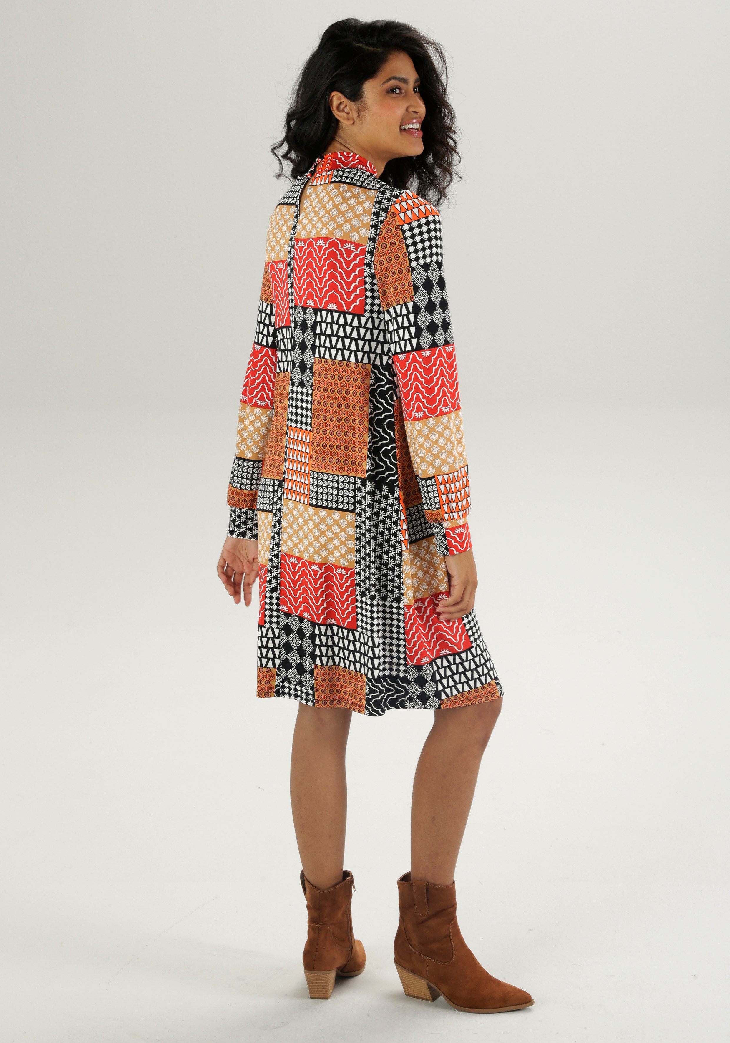 Aniston CASUAL Jerseyjurk met extravagante patroonmix in patch-dessin