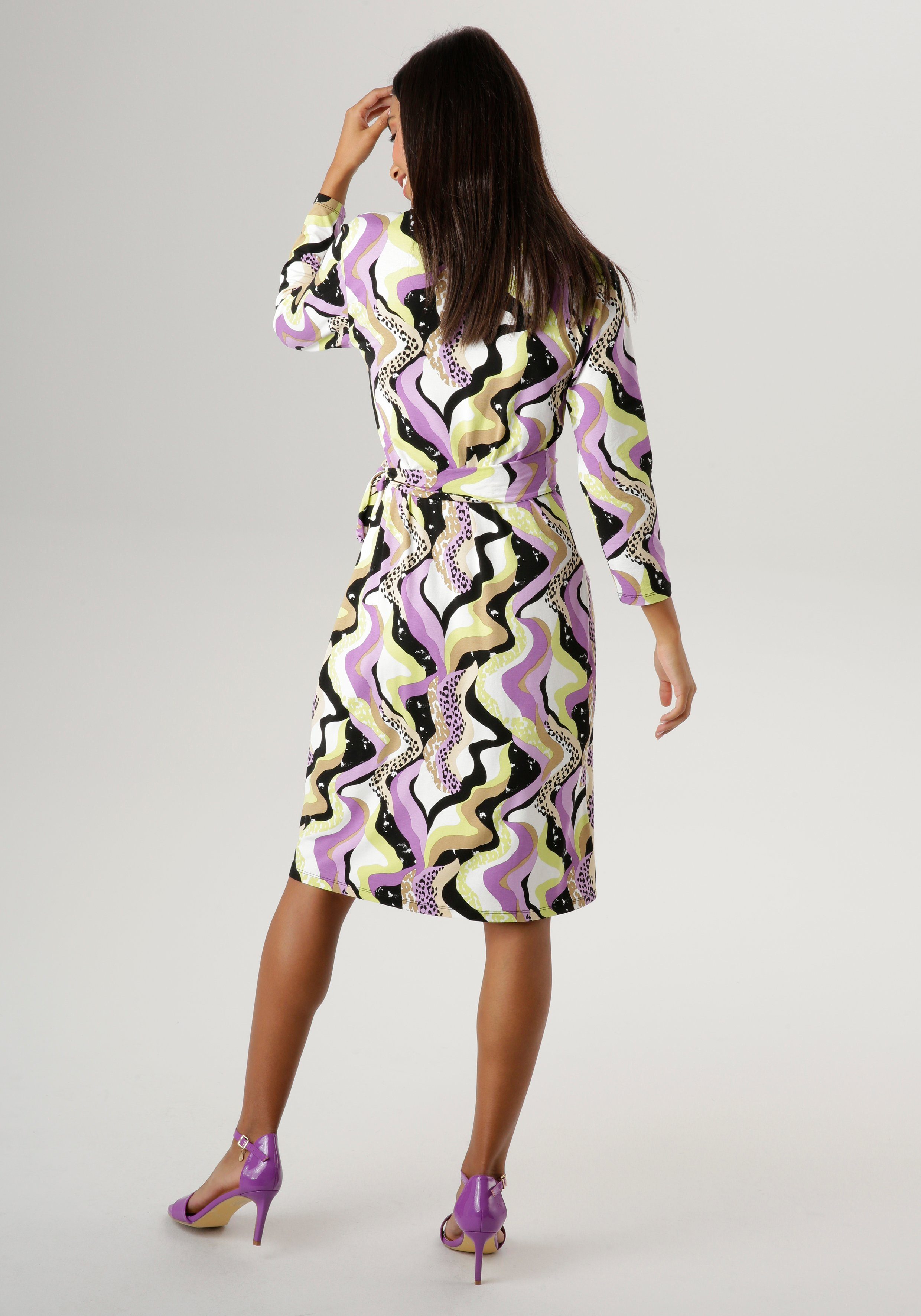 Aniston SELECTED Jerseyjurk met striklint in de taille