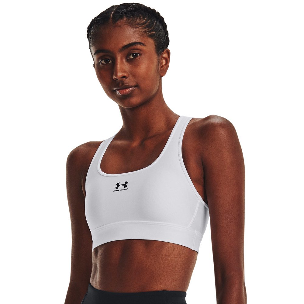 Under Armour® Sport-bh HeatGear® Perfect voor de warme dagen. Houdt je koel en droog.