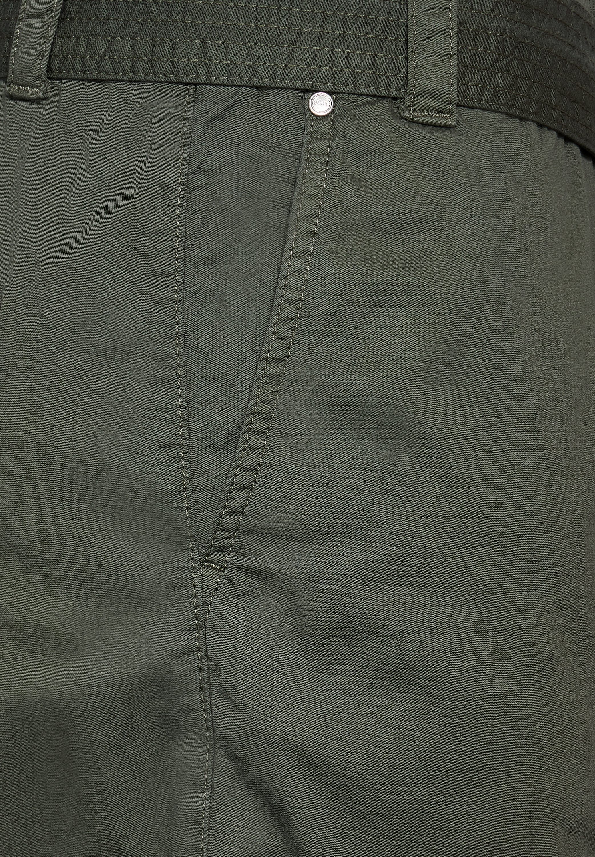 Cecil Midirok met textielen riem