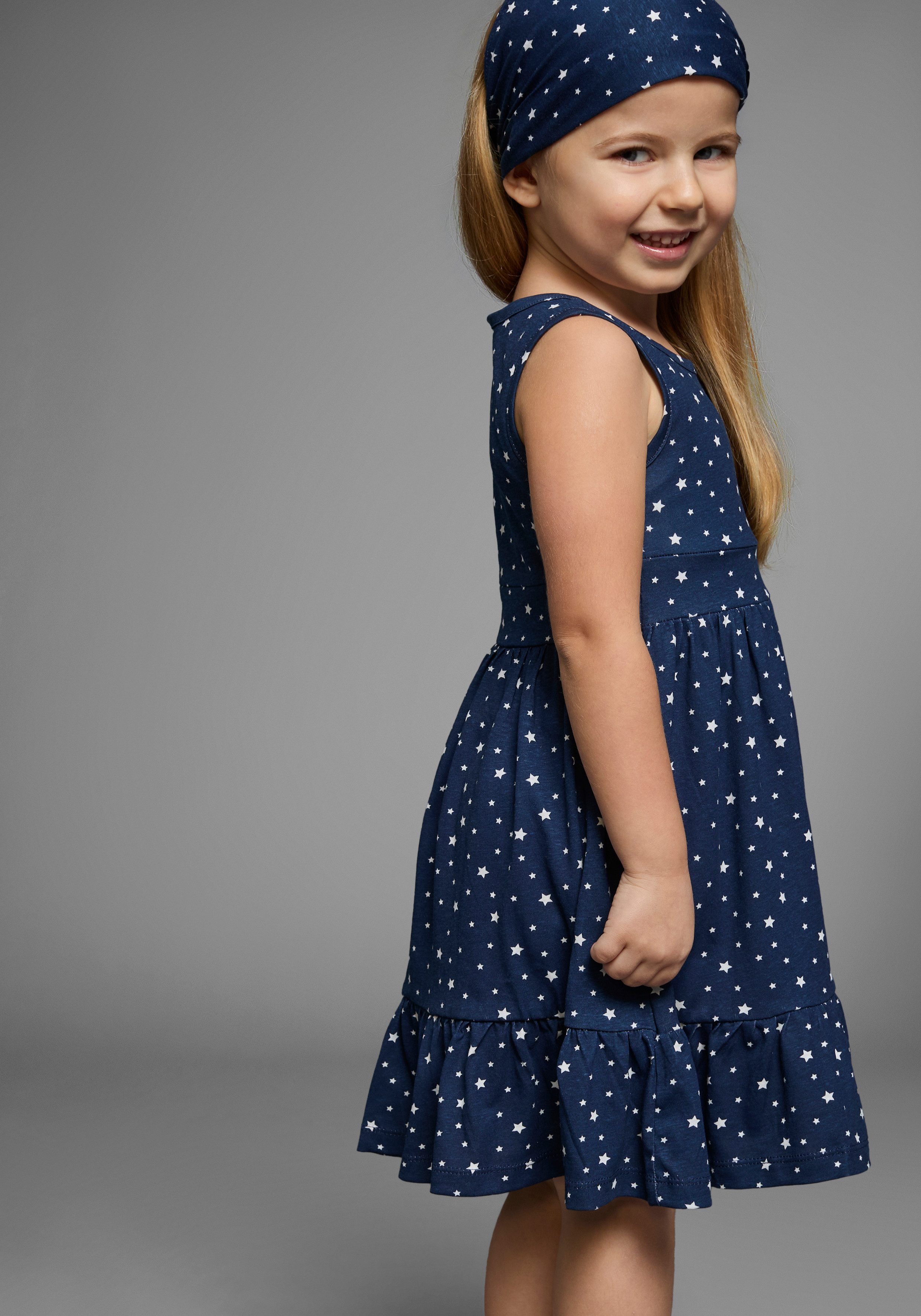 KIDSWORLD Jerseyjurk 2-delig shirtjurk + haarband in schattig sterren-allover feestelijke gelegenheden, knie-lange, speelse stijl, van katoen (set, 2-delig)