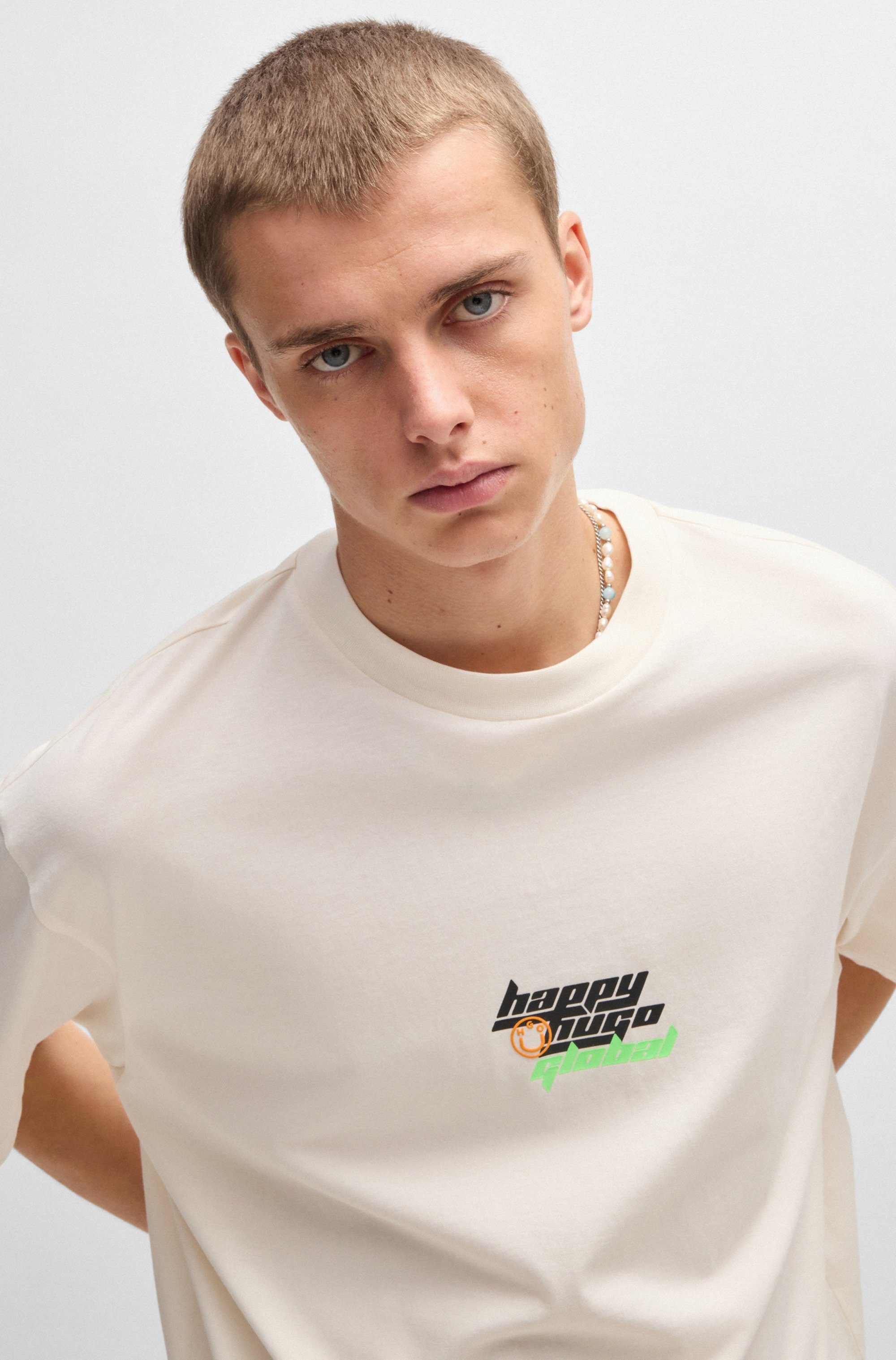 HUGO Blue T-shirt Nerperi met veelkleurig logo-opschrift