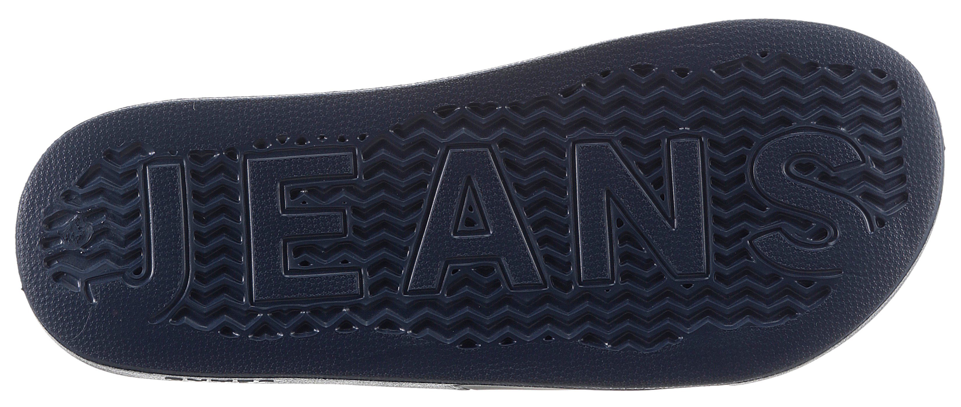 TOMMY JEANS Badslippers TOMMY JEANS POOL SLIDE ESS zomerschoen, badschoens, slippers, met opvallende logo-vlag