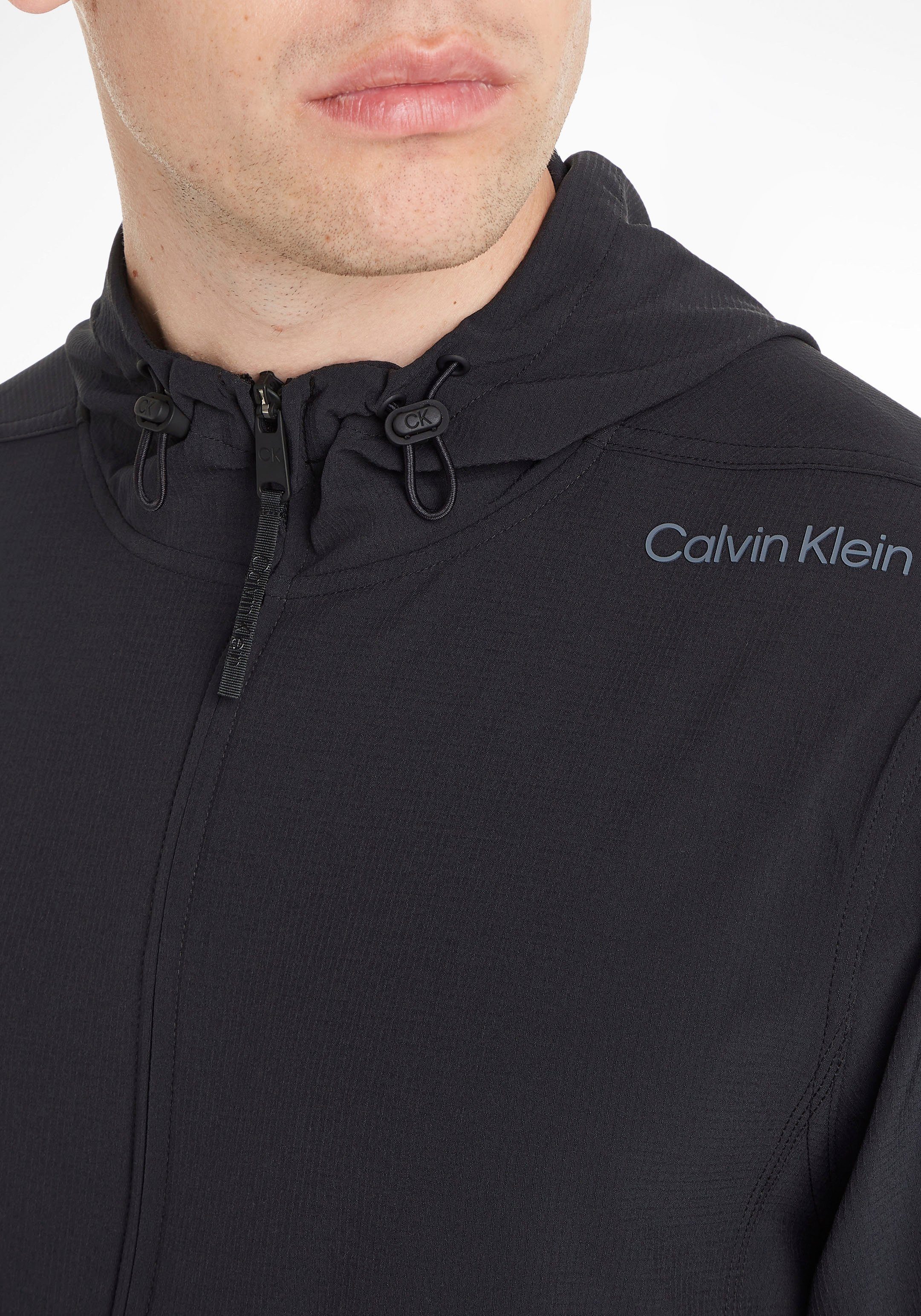 Calvin Klein Performance Outdoorjack met een capuchon en steekzakken