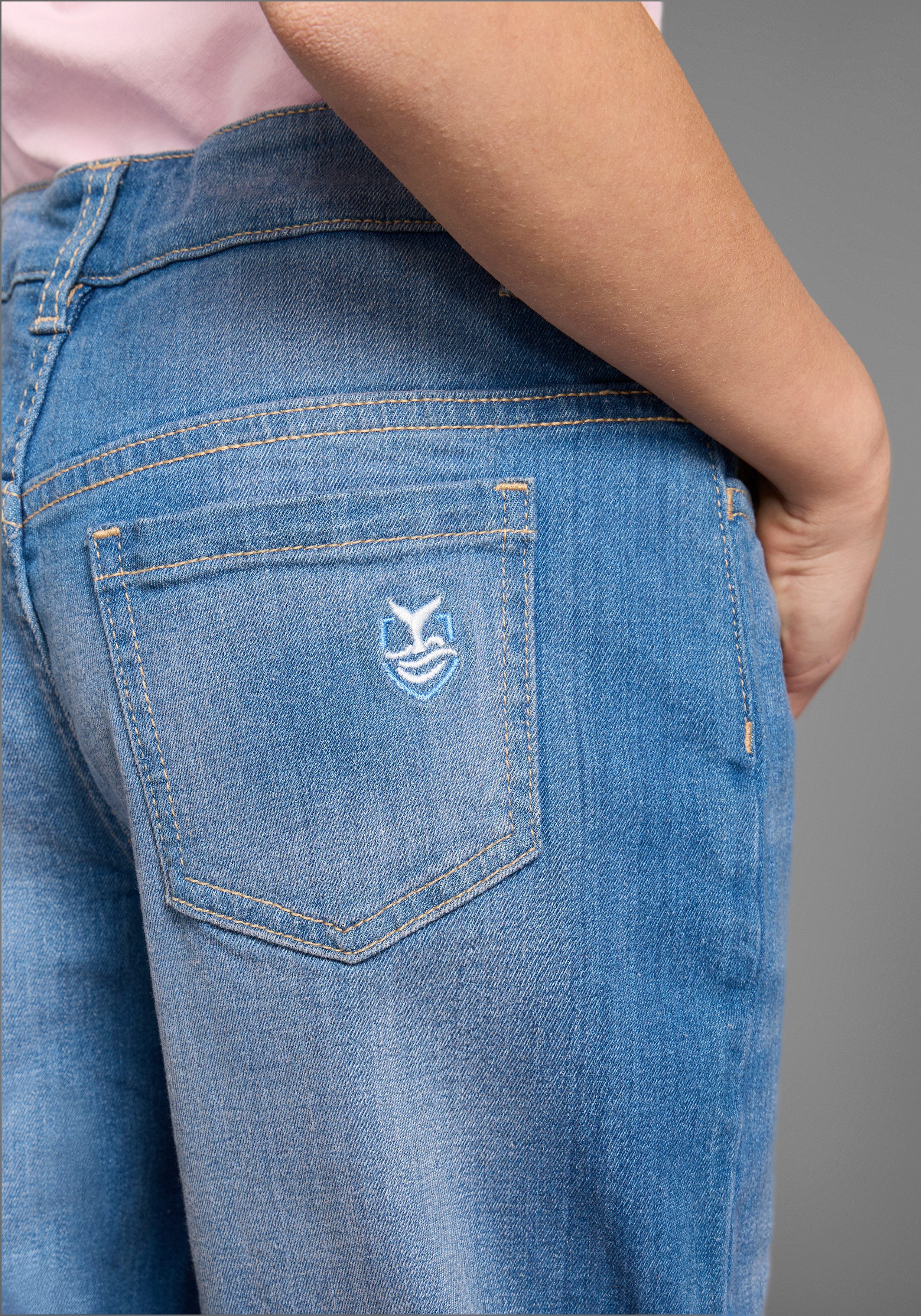 KIDSWORLD Loose fit jeans Meisjesjeans in wijde pasvorm Wijd jeans met logo-borduursel